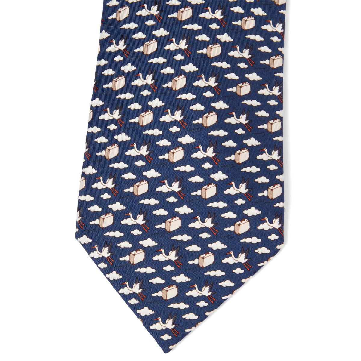 100% authentic Hermes Bird Express ties in dark blue, beige and red silk twill (100%). Has been worn and is in excellent condition. No Box.

Measurements
Model	5454
Length	156cm (60.8in)
Widest Point	9cm (3.54in)

All our listings include only the