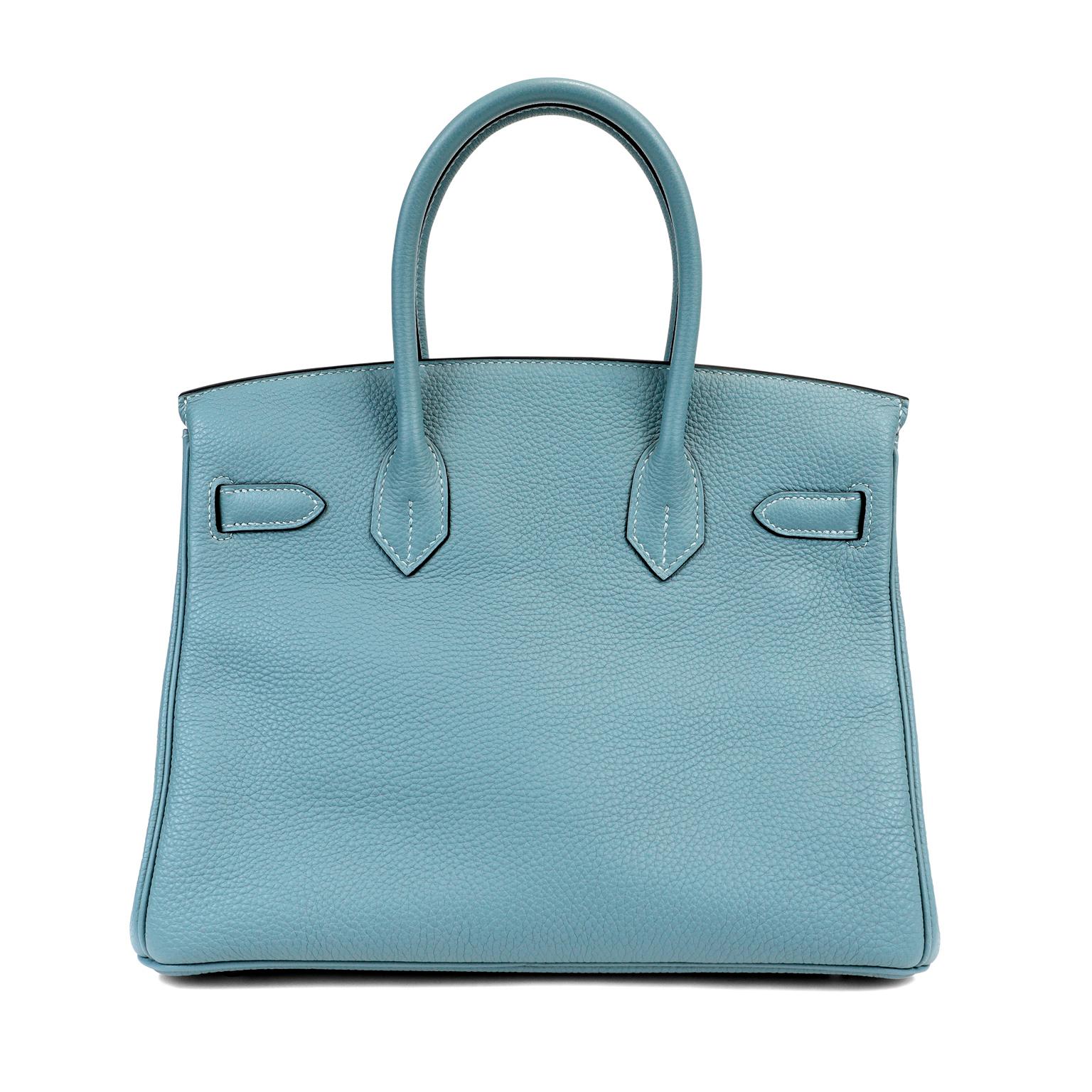 This authentic Hermès Blue Ciel Togo 30 cm Birkin is in excellent condition.    Hand stitched by skilled craftsmen, wait lists of a year or more are common for the Hermès Birkin. They are considered the ultimate in luxury fashion. Bleu Ciel, a pale