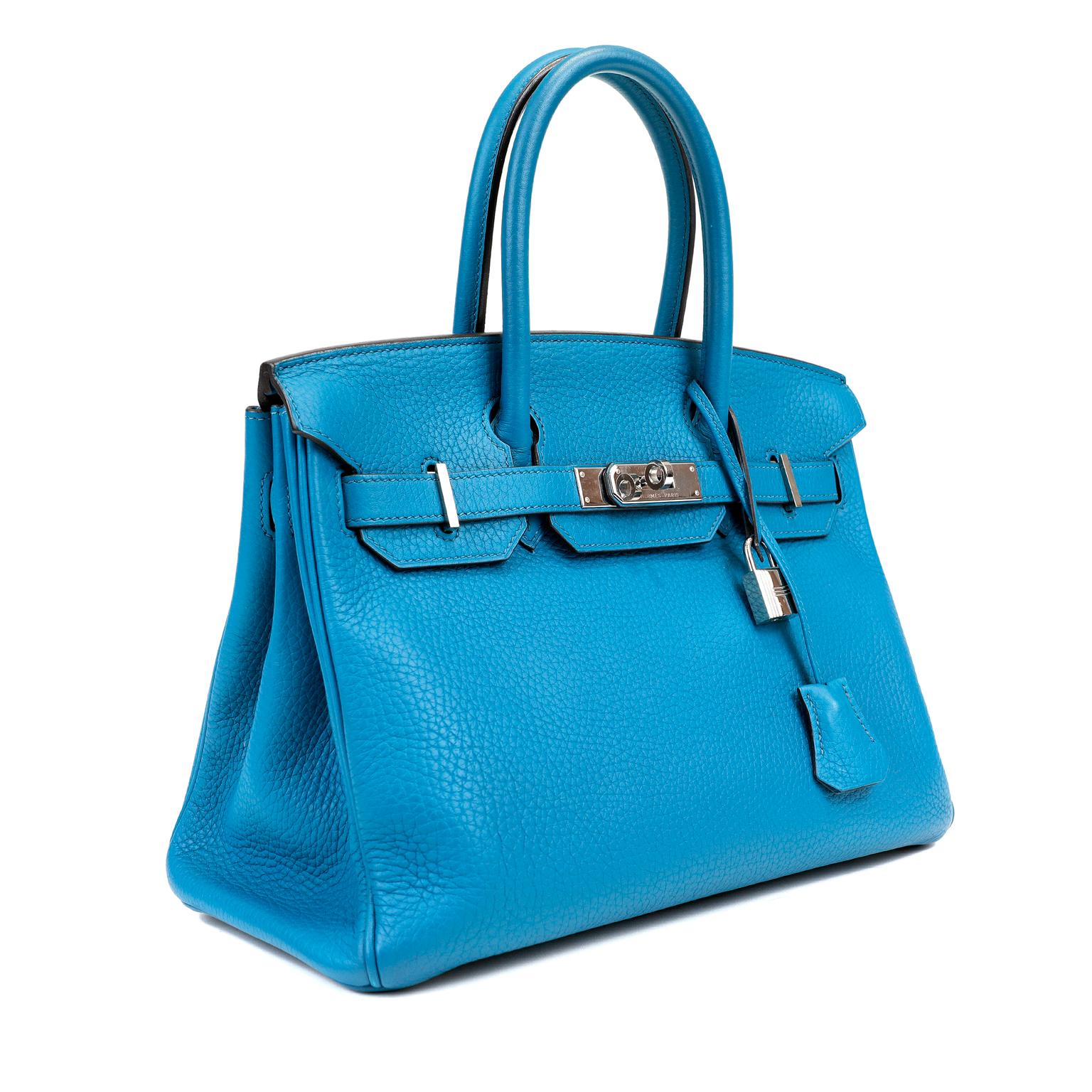 This authentic Hermès Blue Turquoise Togo  30 cm Birkin is in excellent condition.  Hand stitched by skilled craftsmen, wait lists of a year or more are not uncommon for the Hermès Birkin. 
Togo is highly desirable scratch resistant calf leather; it
