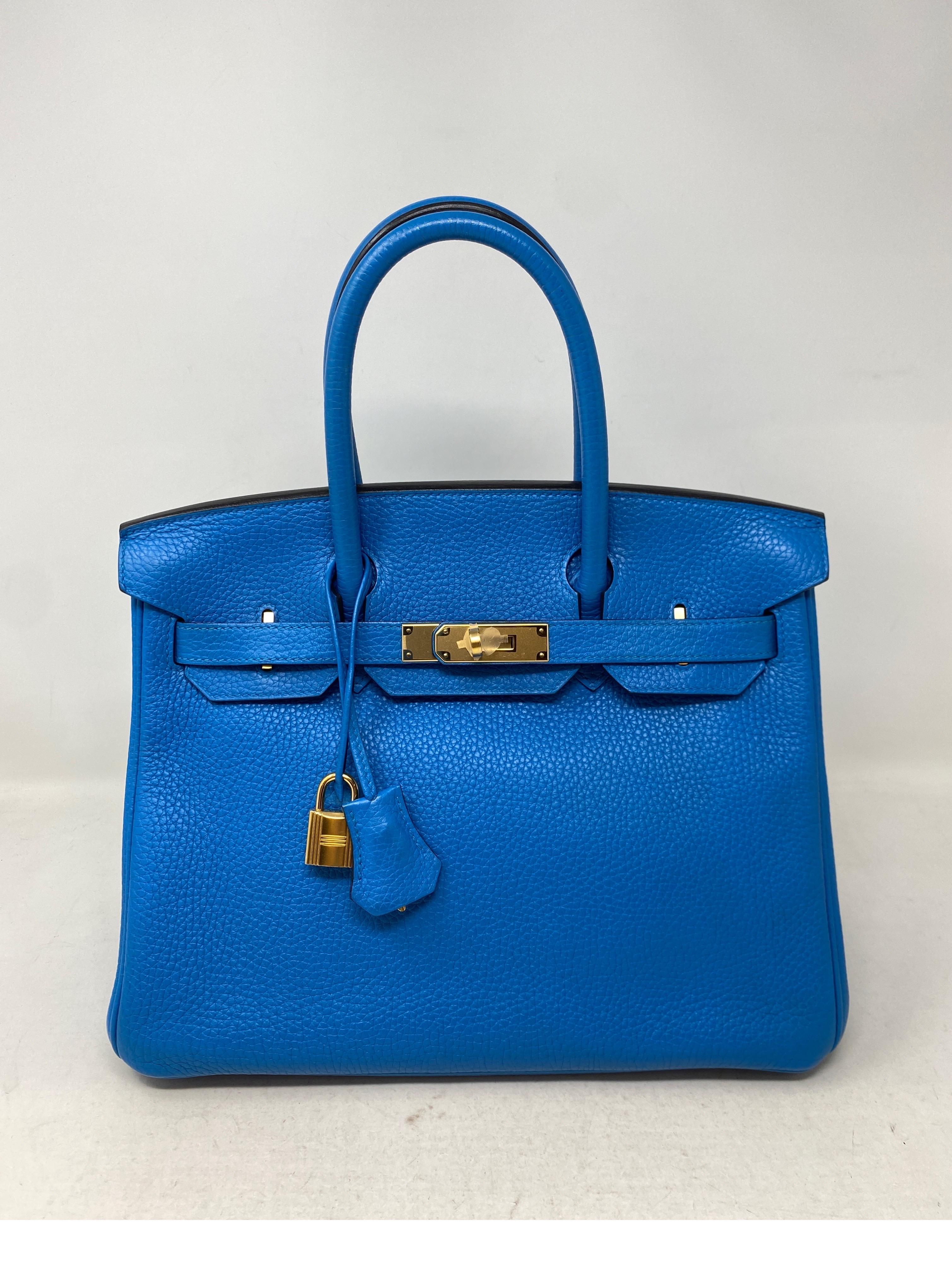 Hermes Blue Zanzibar Birkin 30 Bag. Excellent like new condition. New bag. Rare bright blue color with gold hardware. Clemence leather. Includes clochette, lock ,keys, and dust bag. Guaranteed authentic. Don't miss out on a unique color and size. 