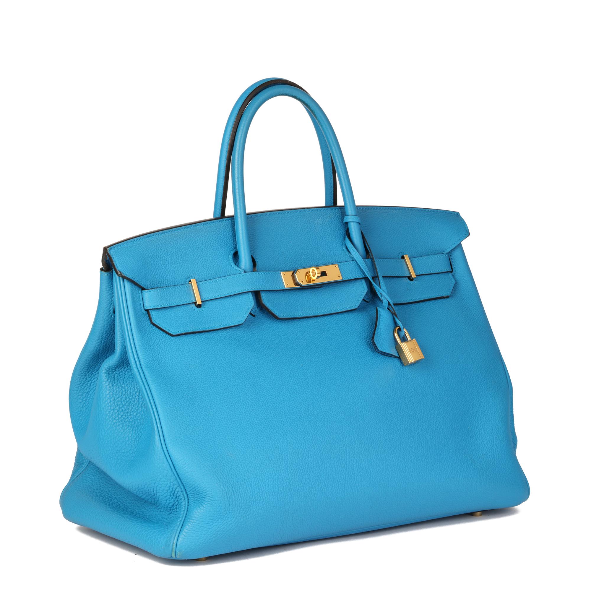 Hermès Blue Zanzibar Togo Leather Birkin 40cm


CONDITION NOTES
The exterior is in very good condition with light signs of use throughout. The bag appears slouchy when empty.
The interior is in excellent condition with minimal signs of use.
The