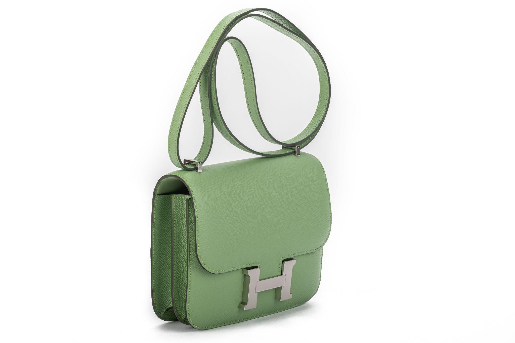 Hermes brand new in box Constance 18 in vert criquet epsom leather and palladium hardware.  Date stamp U for 2022. Brand new in box with felt, booklet, dust cover and box.