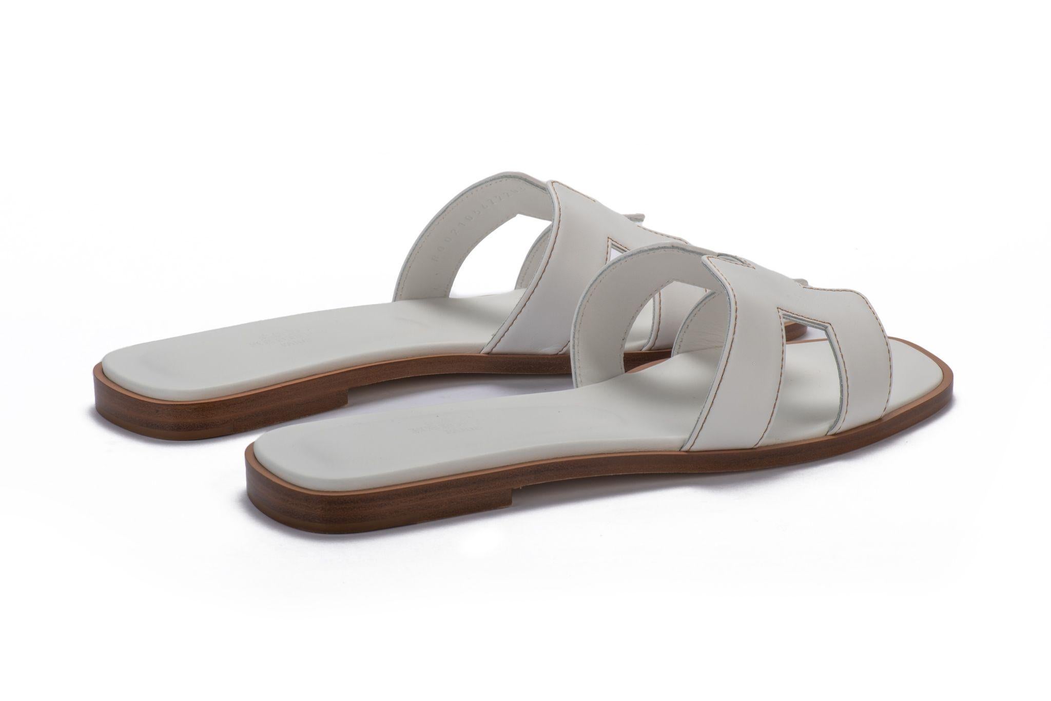 Hermes brand new white calfskin oran sandals. Size European N. 38 1/2, come with dust cover and original box.