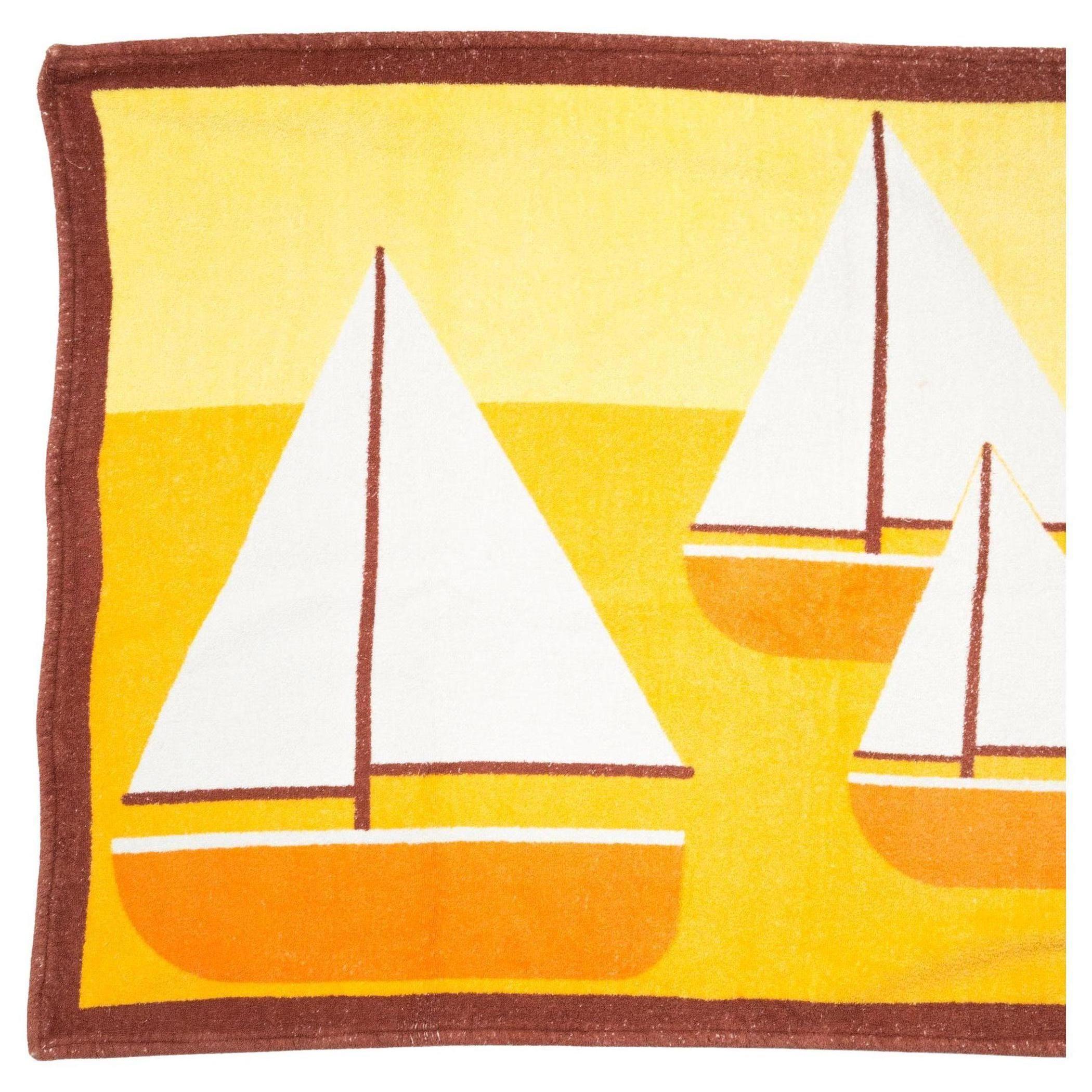 Hermes terry beach towel GM “Boats” towel featuring a yellow ground and a top logo signature.
Circa 2000s 
In good vintage condition  Made in France.
37.4 in. (95cm) X 56.8 in. (145cm)   
We guarantee you will receive this  iconic item as described