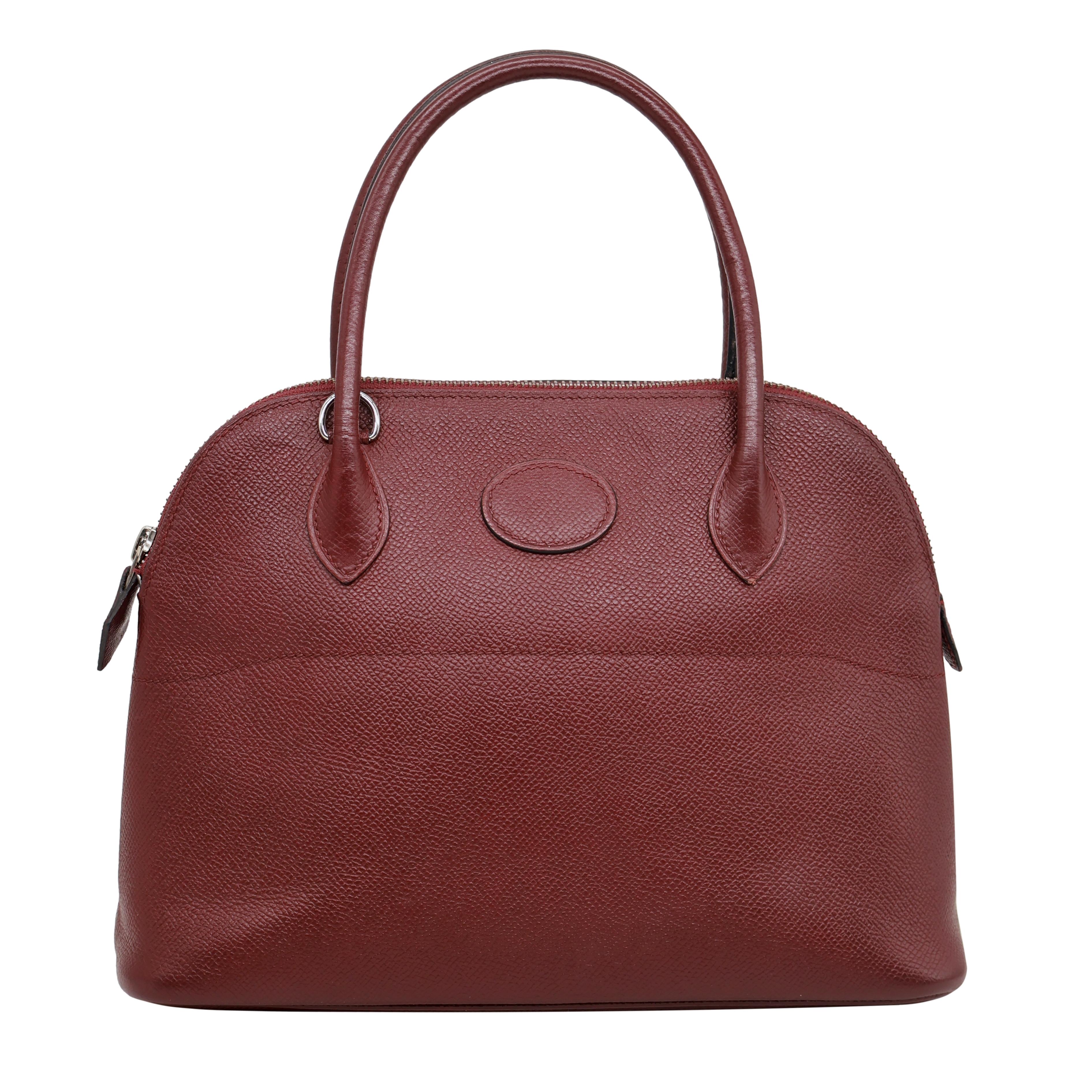 Sac Bolide en cuir Bordeaux Courchevel de 27 cm avec quincaillerie Palladium, 1996. Apparu au début du XXe siècle, le 