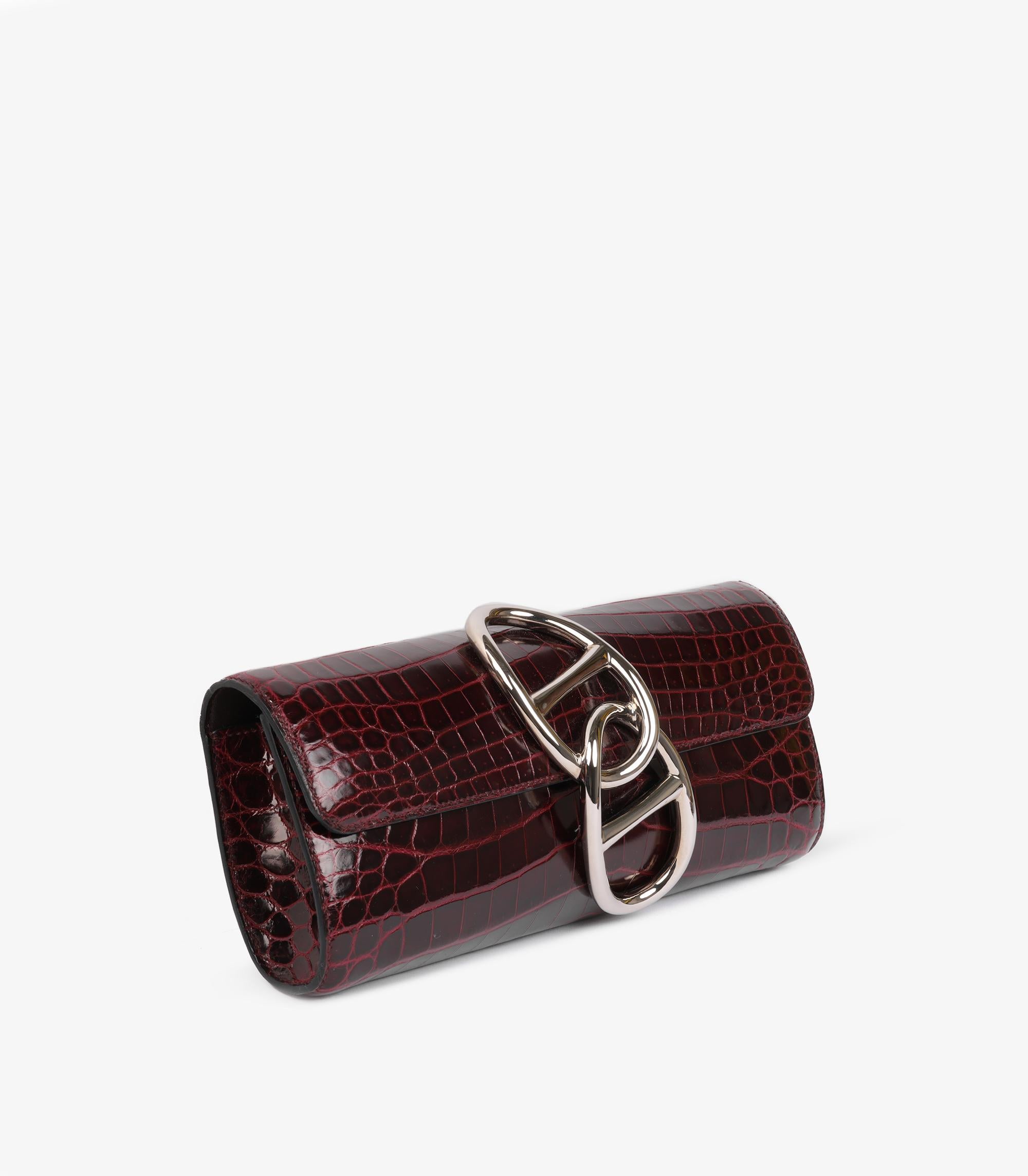 Hermès Bordeaux Shiny Niloticus Crocodile Leather Egee

Product Details
Xupes Ref: CB1454
Brand: Hermès
Model: Egee
Type: Clutch
Serial Number: [P]
Age: 2012
Accompanied By: Hermès Dust Bag
Colour: Bordeaux 
Hardware: Palladium
Material(s): Shiny