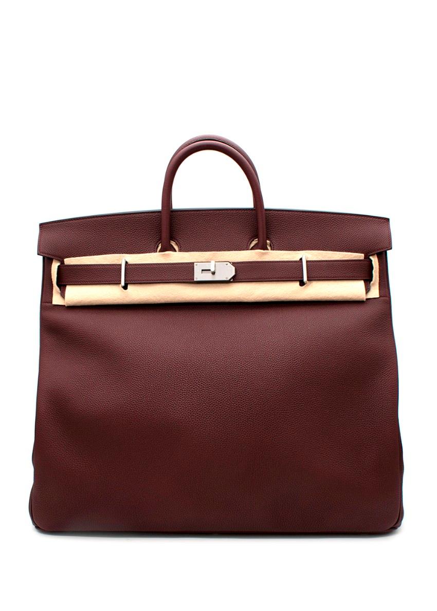 Hermes Bordeaux Togo Leather HAC Birkin 50 HSS PHW

Age: 2021
Serial Number: Z
Horseshoe Stamp - bag made for a special order

- HAC Birkin crafted from togo leather in bordeaux hue
- Two rolled top handles
- Signature twist-lock fastening
-