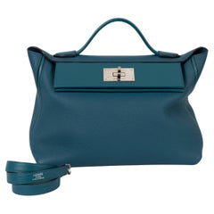 HERMES Bosphore teal Togo / Swift leather 24/24-29 Bag Phw