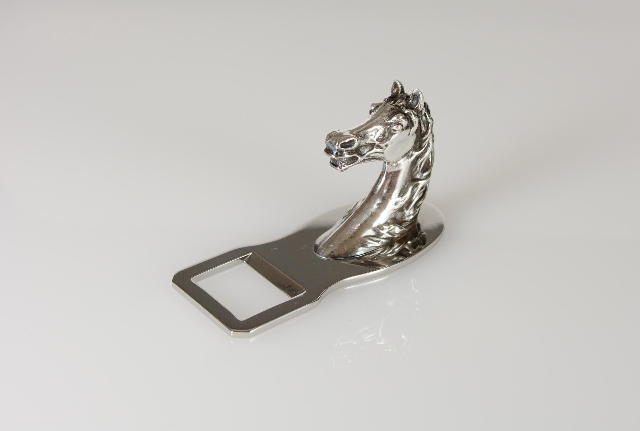An elegant silver-plate equestrian bottle opener designed and retailed by Hermès, manufactured by silversmiths Ravinet d'Enfert, Paris France.
The item is in very good condition, original silver-plating.