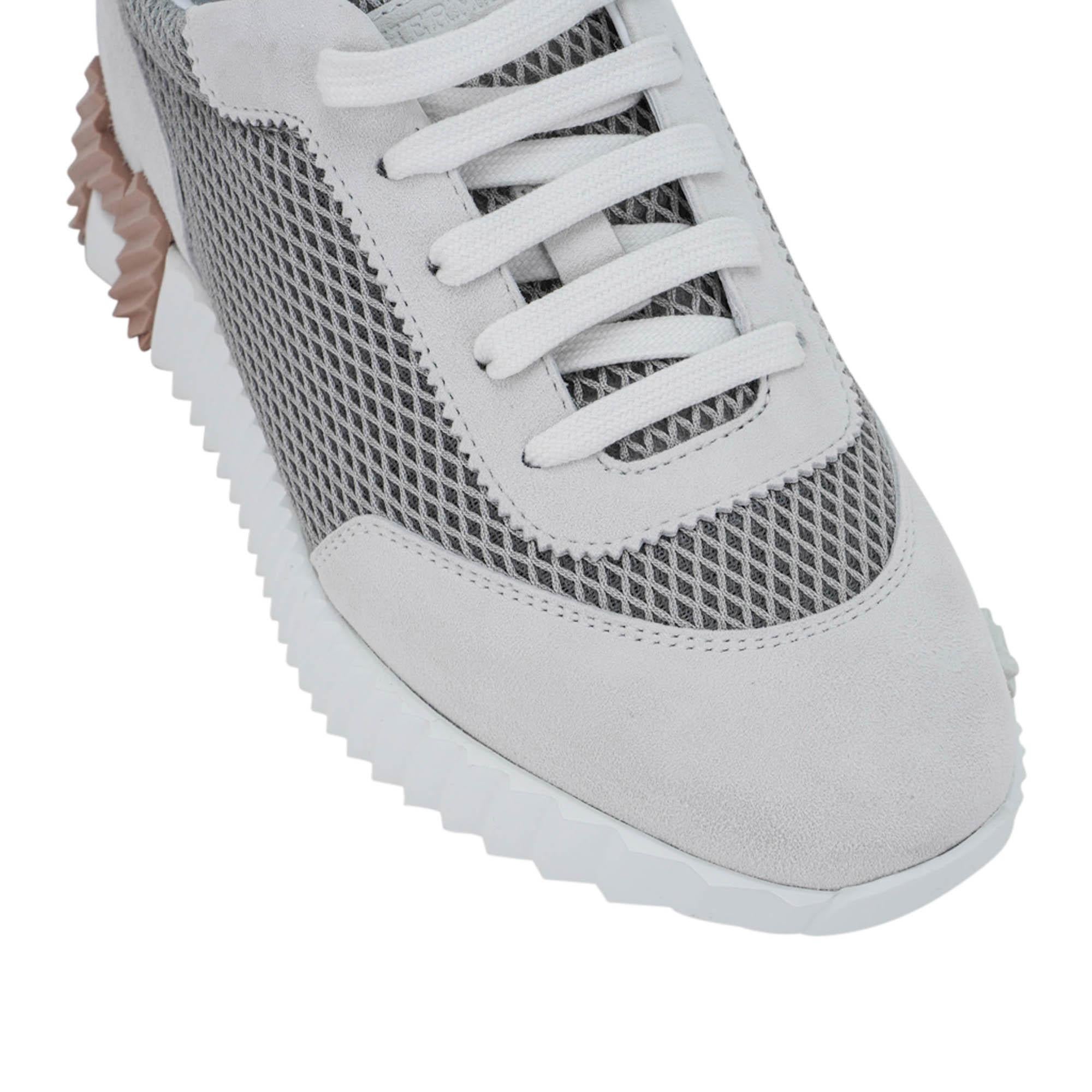 Mightychic offers a pair of Hermes Bouncing Sneaker featured in Gris Lulea and Blanc.
The sneaker is composed of a graphic mesh and goatskin.
H on outside of the shoe as well as the light weight sole.
Made in Italy
NEW or NEVER WORN.
final