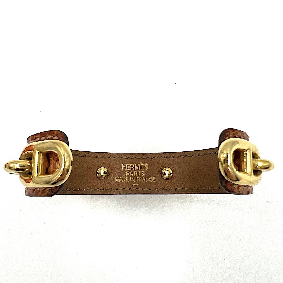 HERMES Bracelet Chaine d'Ancre in Gold Leather and Gilt Metal
In very good condition.
Made in France.
Size: wrist circumference: 16 cm

Will be delivered in a Hermes box.
