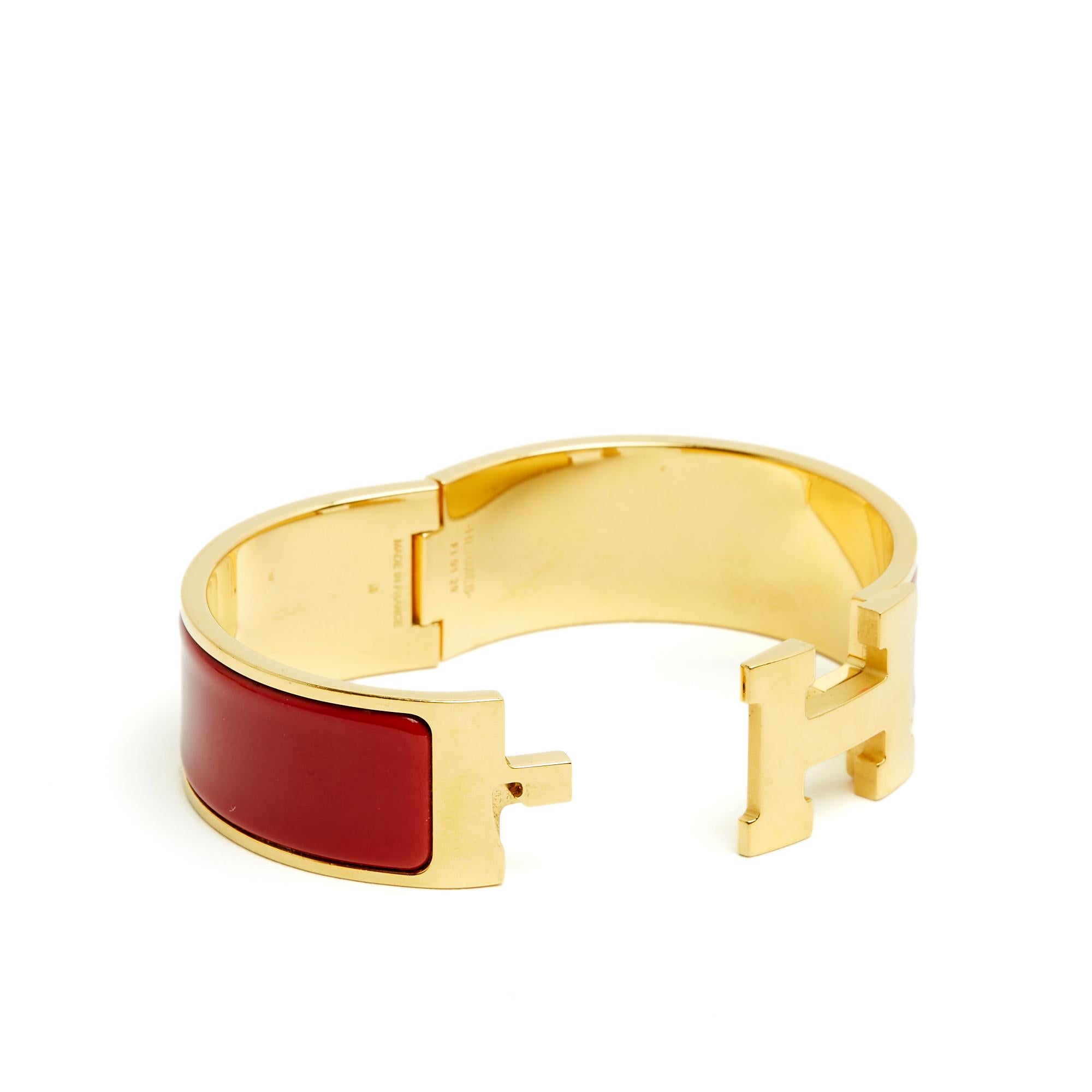 Femenino o masculino Hermès Pulsera Dore Rouge Clic Clac H Metal dorado Esmalte rojo Pulsera Hermes en venta