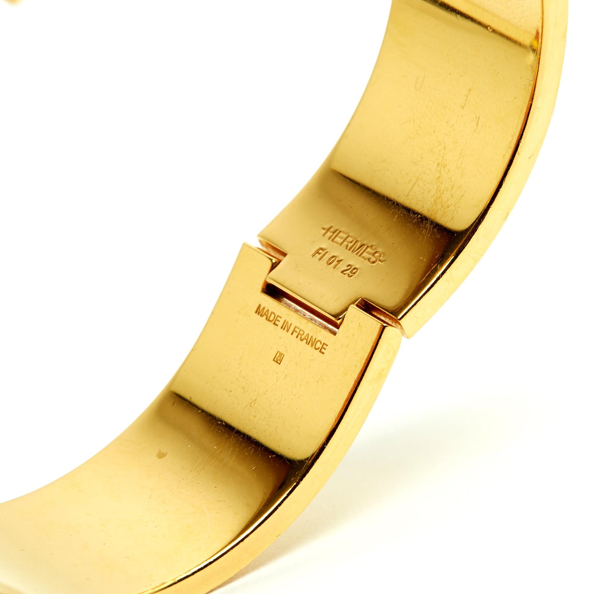 Hermès Pulsera Dore Rouge Clic Clac H Metal dorado Esmalte rojo Pulsera Hermes en venta 2