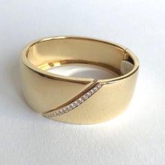 Hermes Bracelet in 18 Carat Yellow Gold and Line of Diamonds