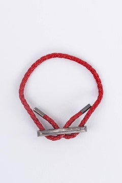 Hermès Bracelet in Woven Red Leather with Silver Buckle