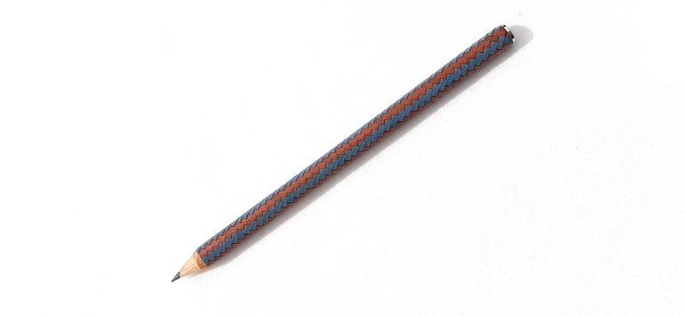 Beautiful Authentic Hermès Lead Pencil

Made in France

Made of Wood and Covered with braided leather

Colorway: Blue, Brown

Writing color: gray

