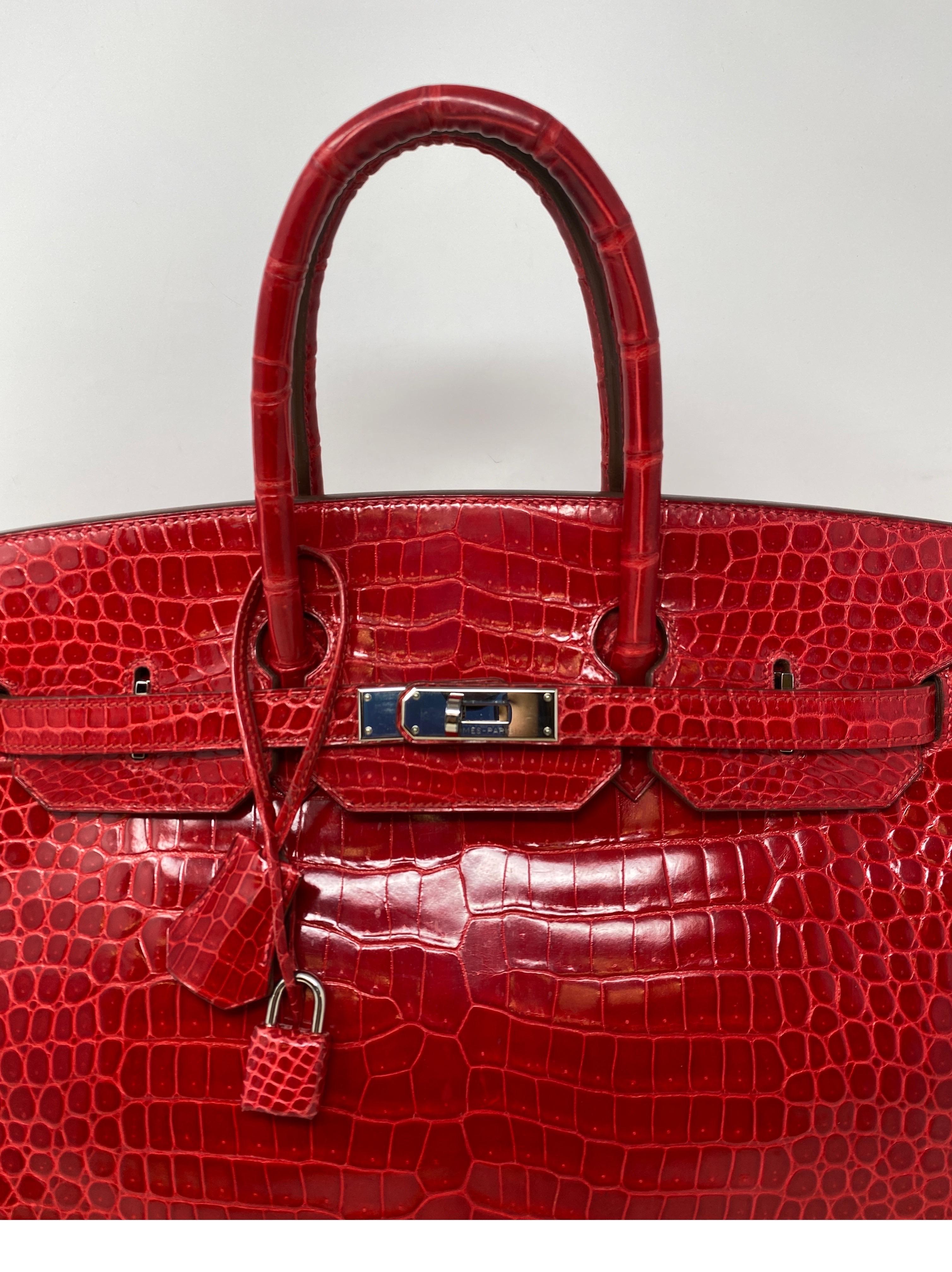 Hermes Braise Red Braise Porosus Crocodile Birkin 35 Bag. L square stamp. From 2008. Palladium plated hardware. Beautiful bright red color Braise crocodile. Very rare exotic crocodile. Investment bag. Porosus Crocodile bags bring the most on the