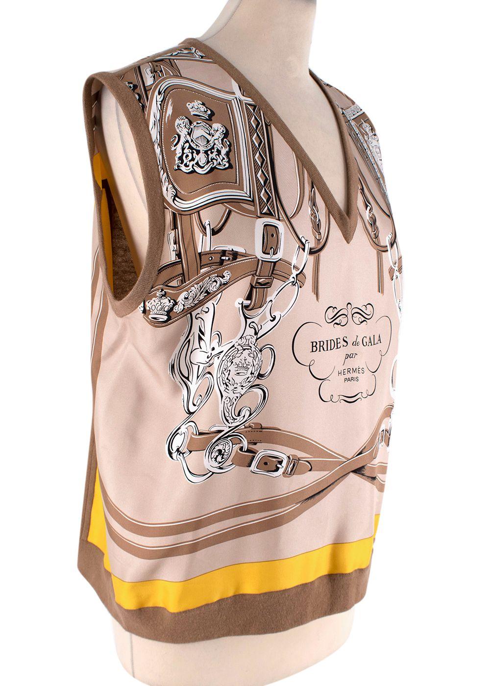 Hermes Brides De Gala Silk Knit Vest

- Brides De Gala silk scarf print in brown, beige and yellow hies
- Knit panel in back 
- V-neck 
- Ribbed collar, arm holes, and hemline

Item measured on flat surface, seam to seam. 

42cm Shoulder to shoulder