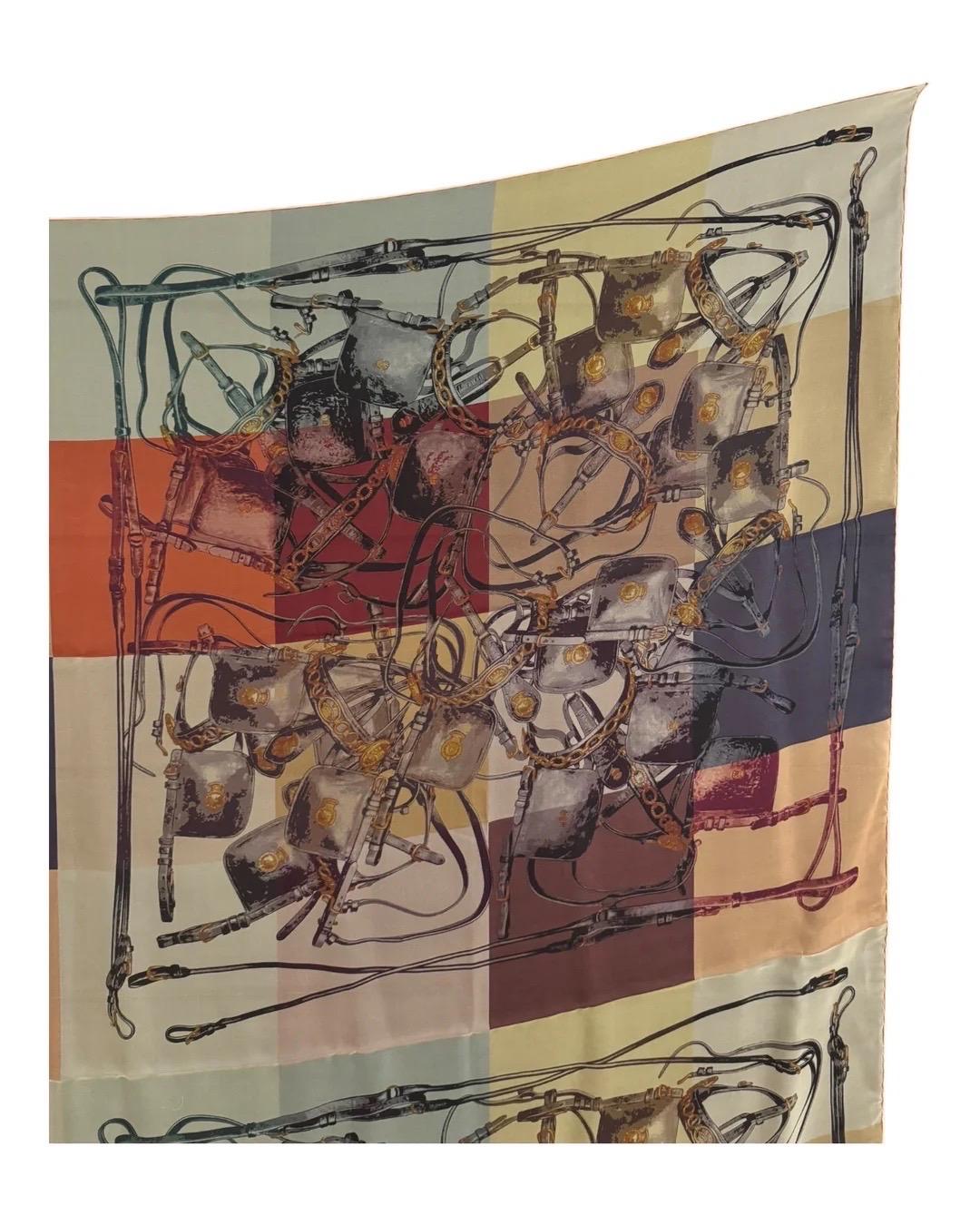 A bold reinterpretation of Hermès’ classic equestrian themes, the ‘Brides Rebelles’ carré by Benoît-Pierre Emery brings together heritage and modernity in a kaleidoscopic composition of bridles, straps, and metallic hardware. This extra-large 140cm