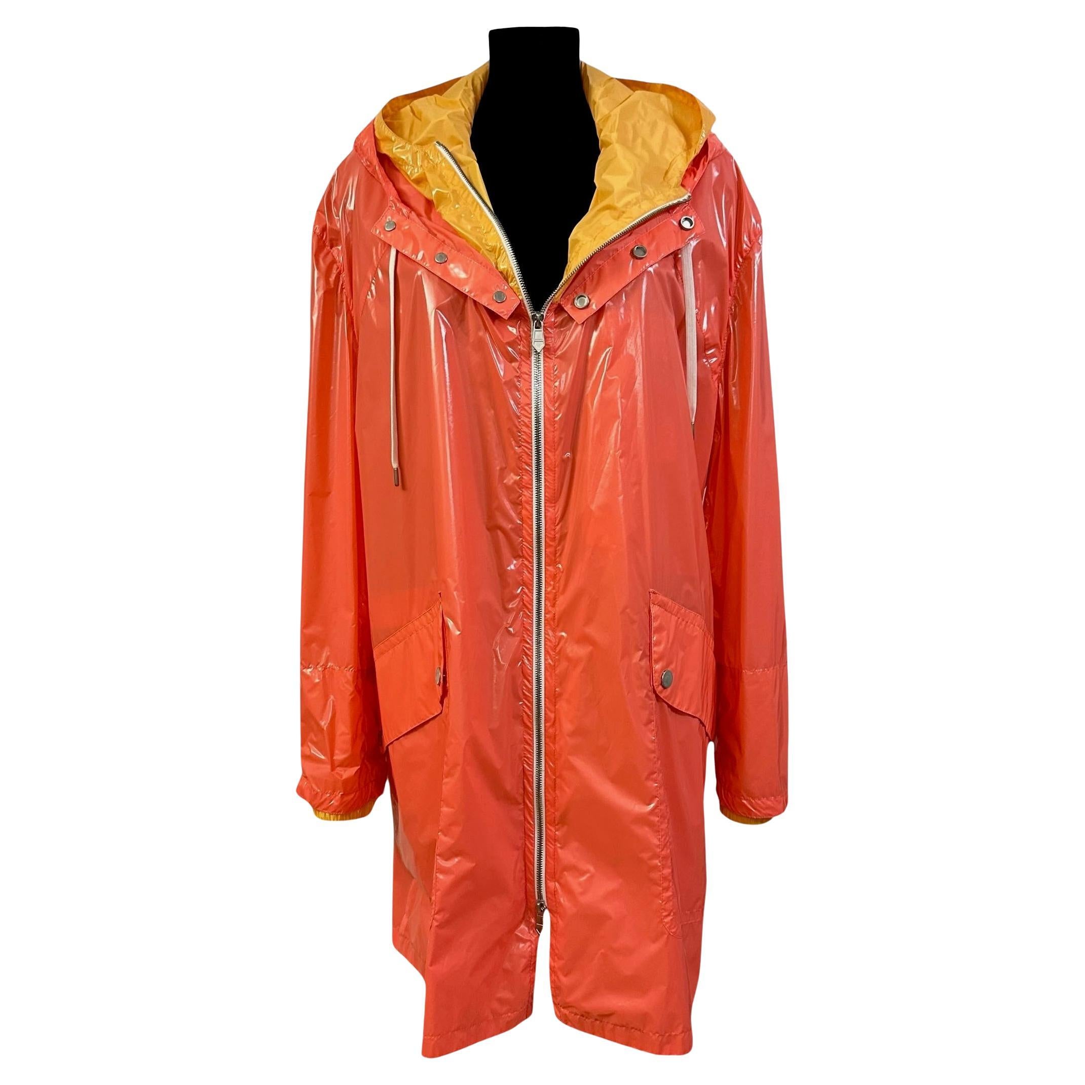 Hermès Windbreaker-Jacke mit Kapuze in leuchtendem Orange und Gelb im Angebot