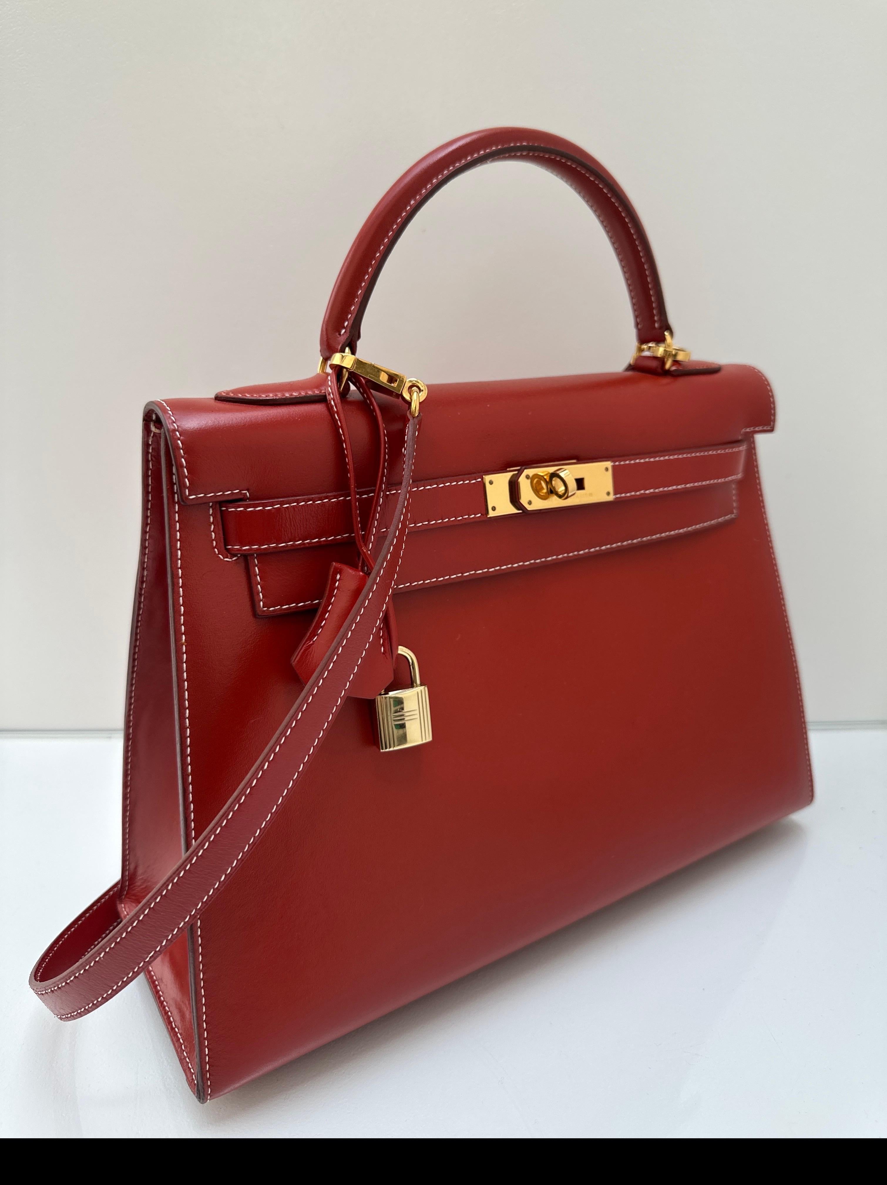 Hermes Brique Kelly 32 Bag. Excellent condition for vintage. Brick color bag with gold hardware. Interior clean. Box smooth leather. Includes clochette, lock, keys, and dust bag. Great investment bag. Don't miss out on this one. Guaranteed