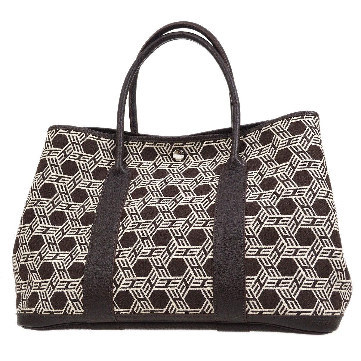 Donna HERMES Borsa Tote marrone crema avorio con motivo Toile in tela e finiture in pelle in vendita