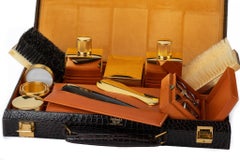 Hermès - Trousse de toilette en croco brun