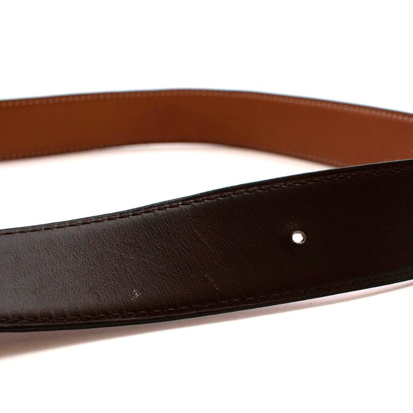 Hermes Brown Reversible Leather Belt Strap

-Made of soft swift leather 
-Gorgeous brown hues 
-Reversible 
-Age: N square- 2010
-Timeless elegant design 

Materials:
leather 

Made in France 

3x109 cm