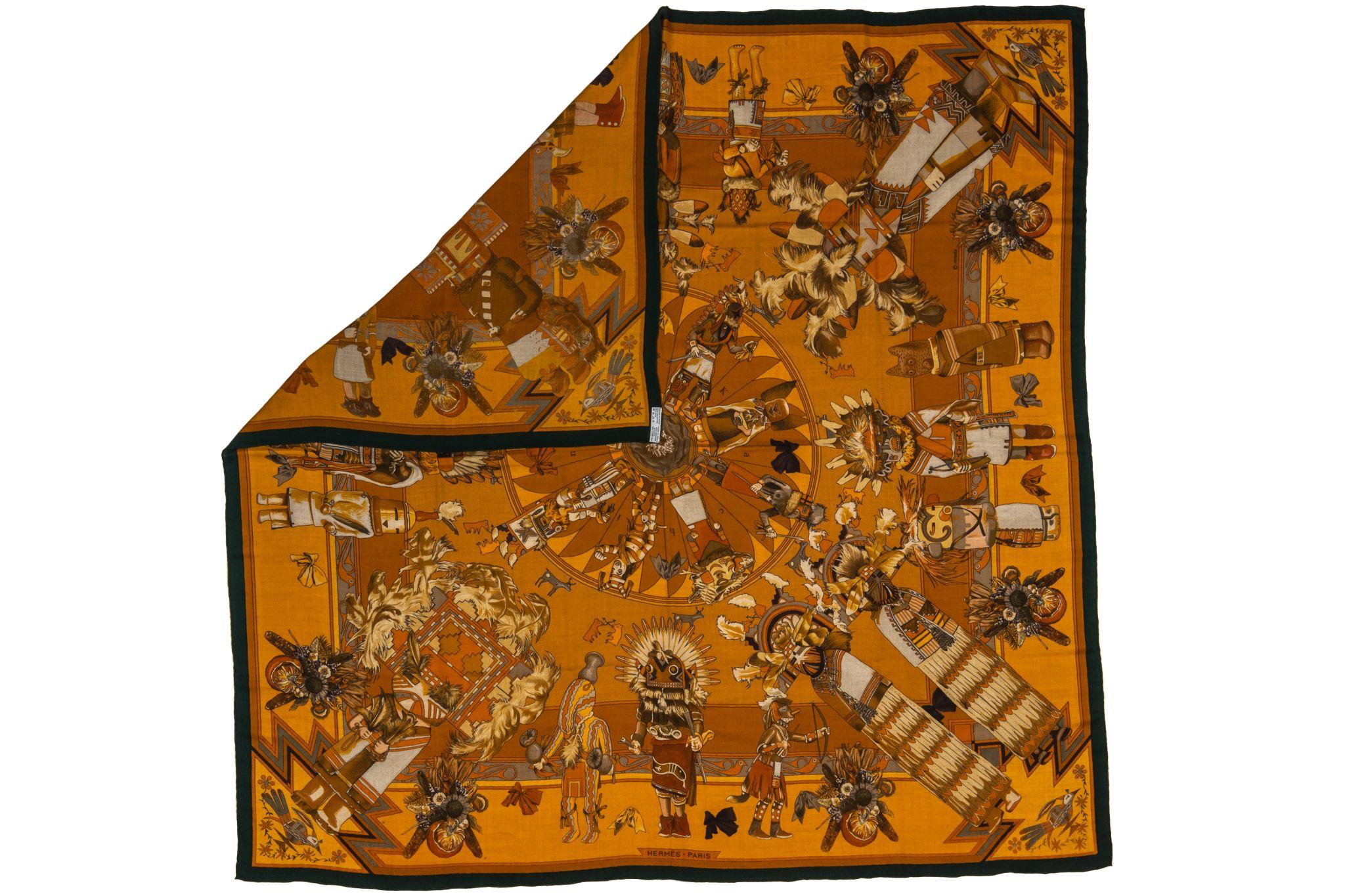 Hermès rare Kachinas washed silk brown scarf designed by artist Kermit Oliver. Signature print from this artist. Beautiful silk twill with hand rolled edges. Has a pulled thread please look at pictures.