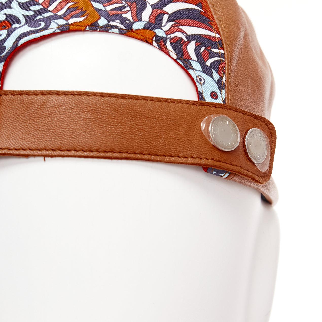 HERMES brown lambskin leather navy orange cotton silk scarf patch cap 57cm
Reference: AAWC/A00928
Brand: Hermes
Material: Lambskin Leather, Cotton, Blend
Color: Brown, Navy
Pattern: Geometric
Closure: Snap Buttons
Lining: Orange Fabric
Extra