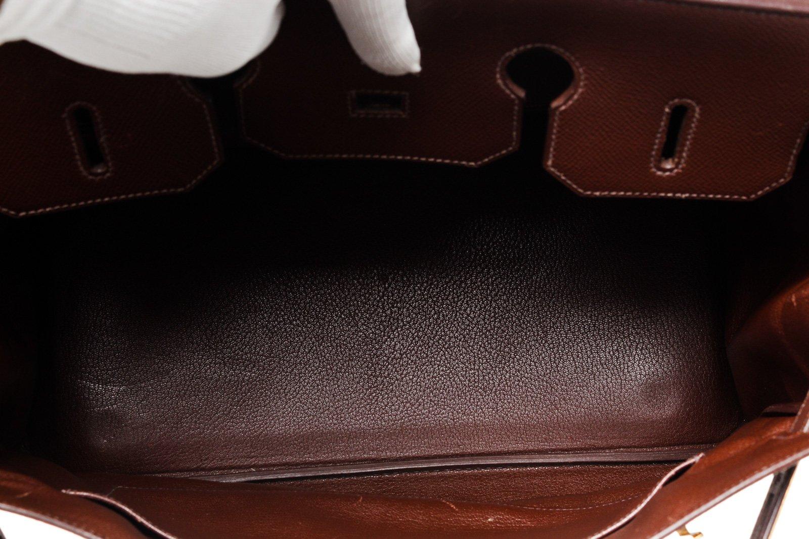 Hermes Brown Leather Birkin 35cm Satchel Bag with leather, gold-tone hardware, trim leather, interior slip pocket, dual top handle and turn lock closure.

47182MSC
