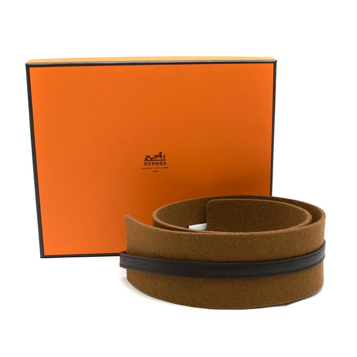 Hermes Brown Leather & Tan Wool Felt Belt

- wool felt large body with thin leather strap
- 3 adjustable belt holes 
- small palladium buckle

Please note, these items are pre-owned and may show some signs of storage, even when unworn and unused.