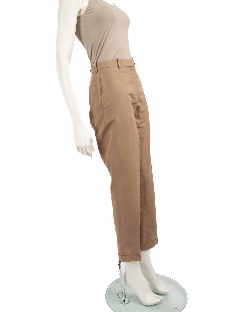CONDITION is Very good. Minimal wear to the trousers is evident. Light discolouration to the front centre, front bottom-left leg and rear waistline. Loose thread to the front internal hemline of the left leg. Due to missing stitching, there is a