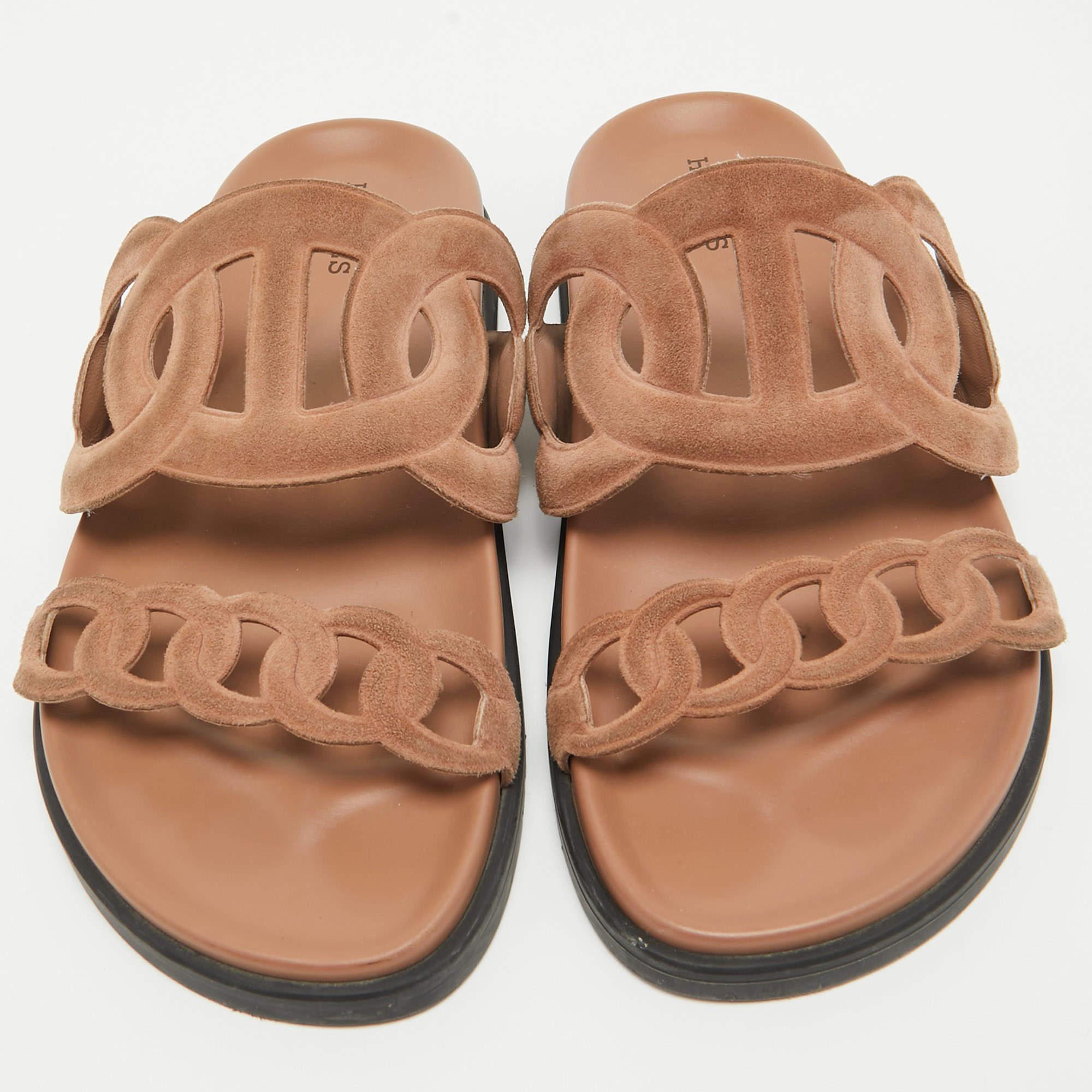 Let this comfortable pair be your first choice when you're out for a long day. These Hermes slides have well-sewn uppers beautifully set on durable soles.

Includes: Original Dustbag

