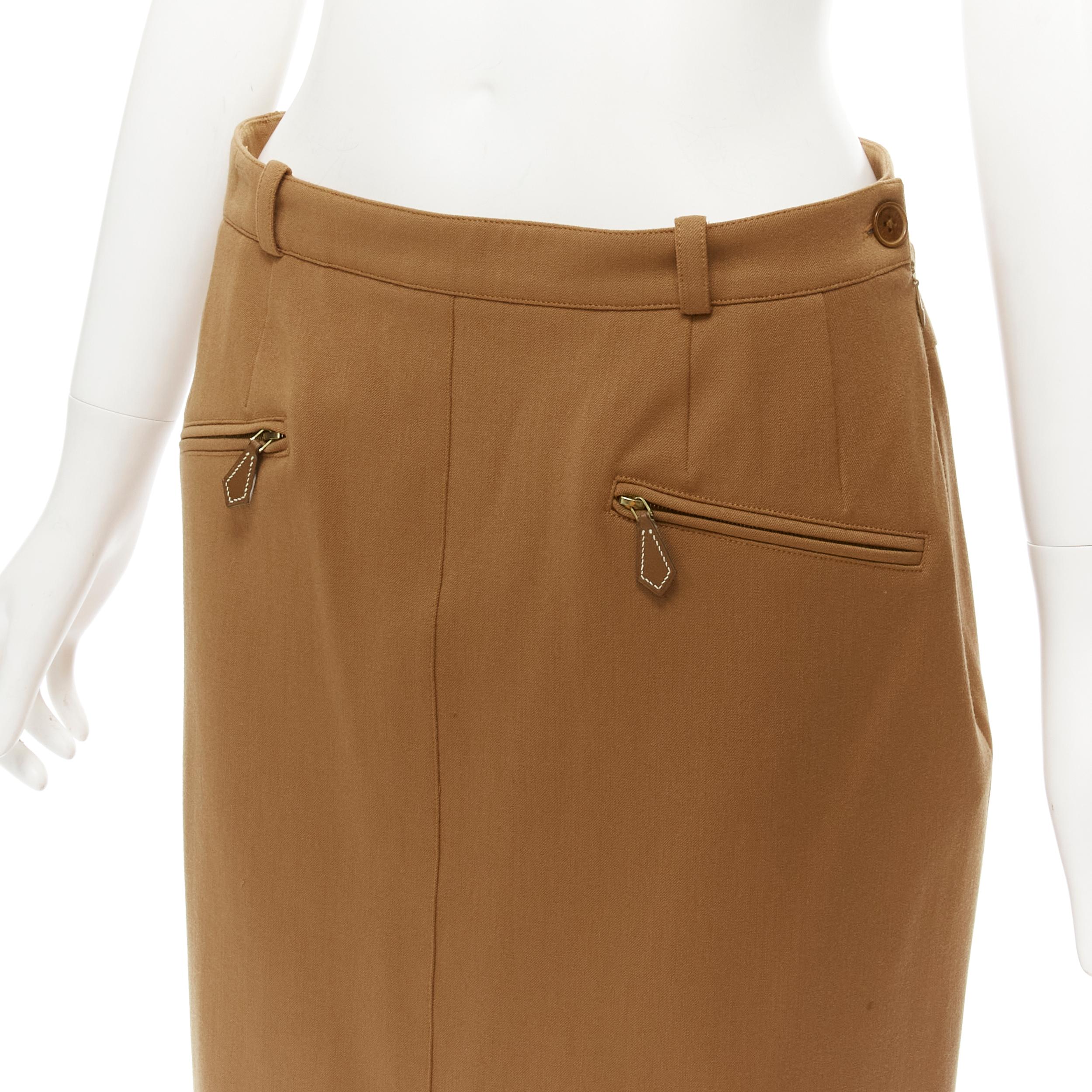 HERMES brown wool blend leather Sellier zipper pocket pencil skirt FR42 L 
Reference: JYLM/A00023 
Brand: Hermes 
Material: Wool 
Color: Brown 
Pattern: Solid 
Closure: Zip 
Extra Detail: Leather zipper pull. 
Made in: France 

CONDITION:
