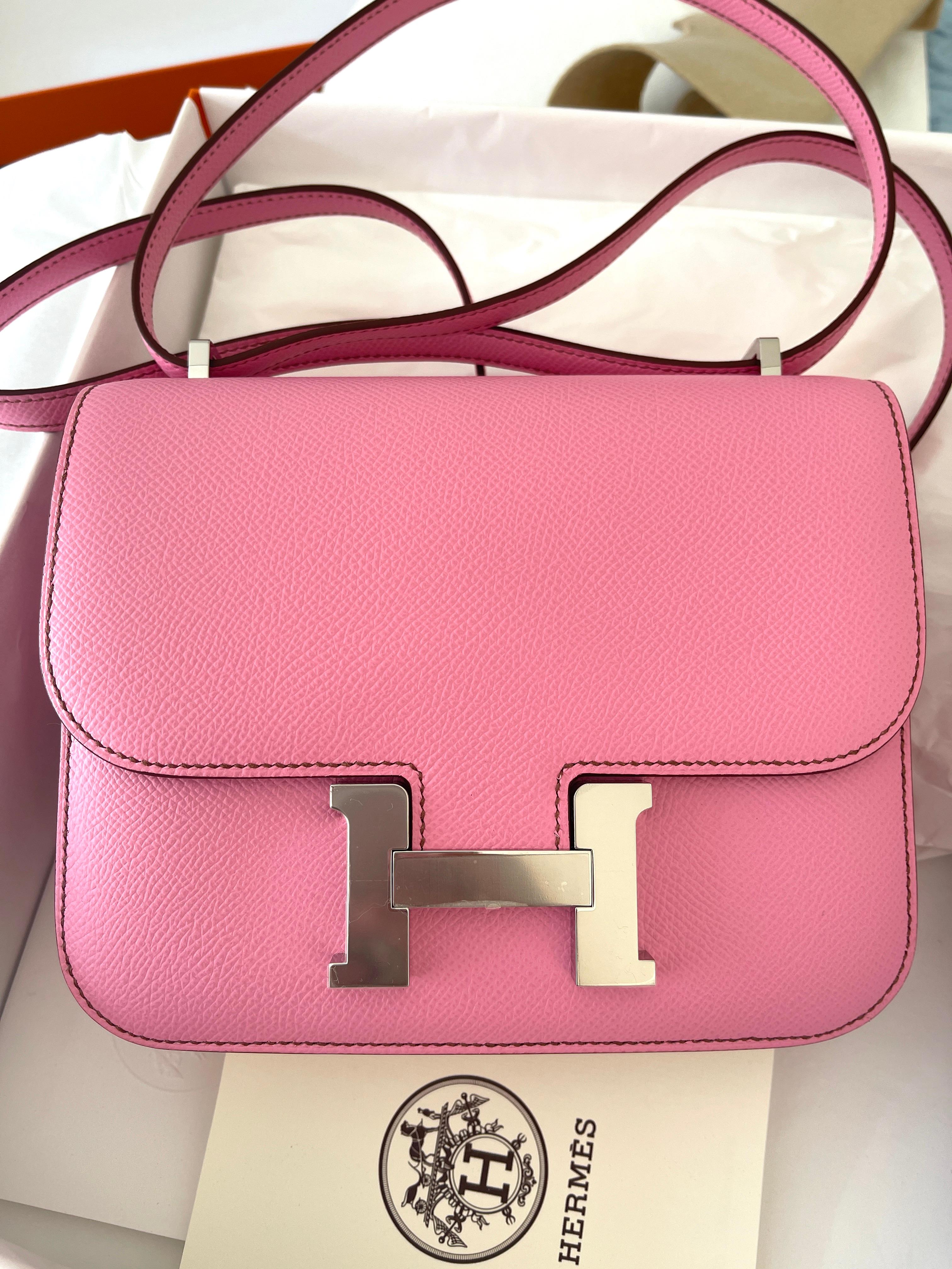 
Hermes Constance 18cm Mini
Bubblegum the most desired pink from Hermes, and the most limited

This Constance is in Bubblegum epsom leather with palladium hardware and has contrast stitching, a metal 