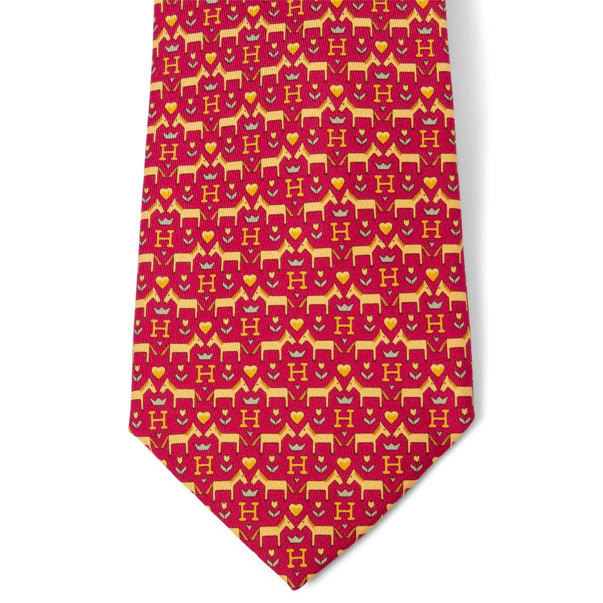 100% authentic Hermes Horses & H ties in burgundy, camel and yellow silk twill (100%). Has been worn and is in excellent condition. No Box.

Measurements
Model	7931
Length	156cm (60.8in)
Widest Point	9cm (3.54in)

All our listings include only the