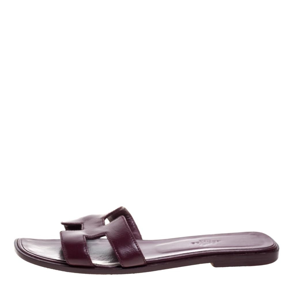 Put your best foot forward this season in these pretty Hermès flats. These burgundy Oran sandals have been crafted from high-quality leather in Italy and feature the iconic H on the vamps. The comfortable insoles meant to provide comfort at every