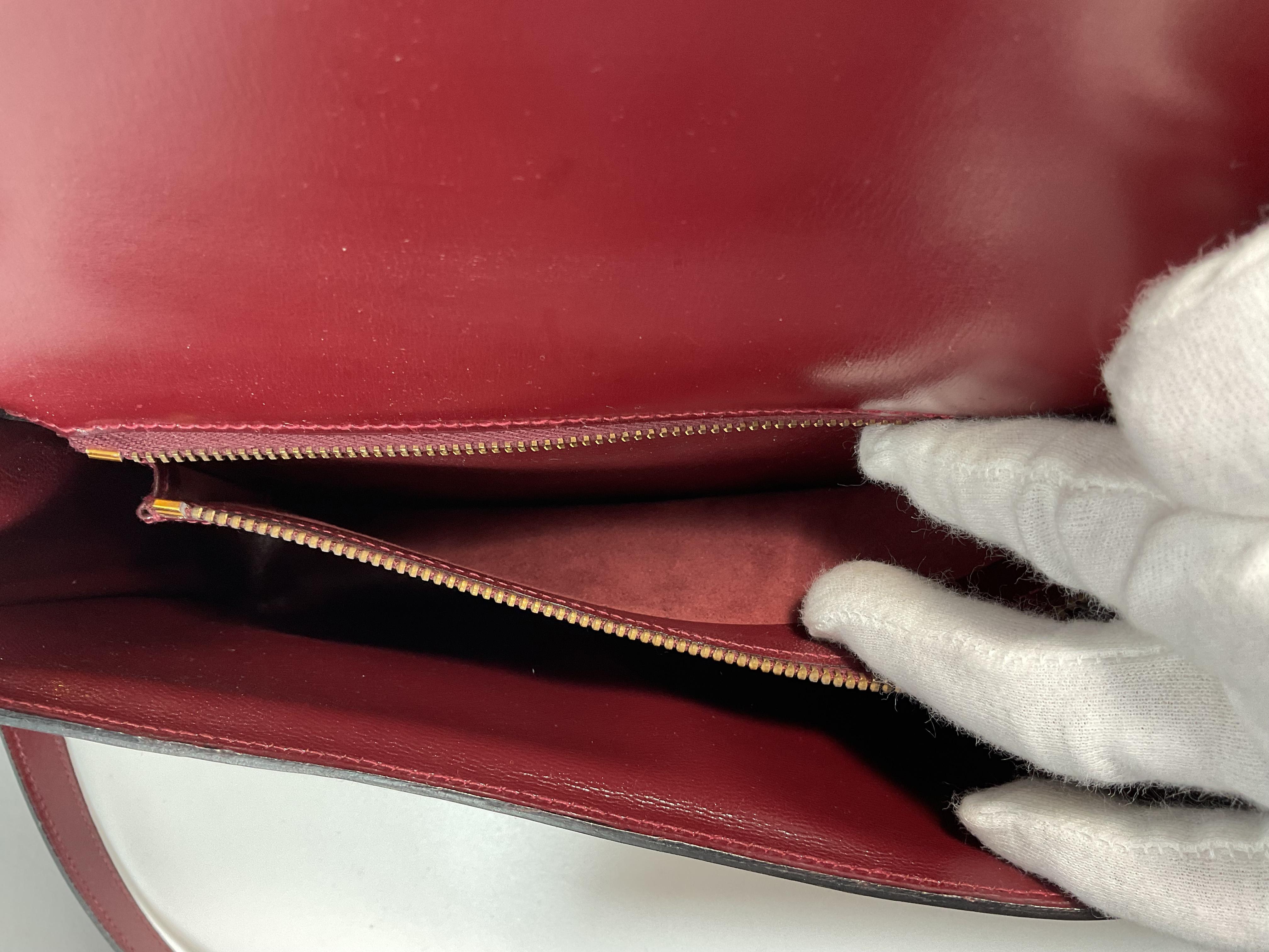 HERMÈS Burgundy Leather Two-Way Crossbody Bag with Adjustable Strap For Sale 5