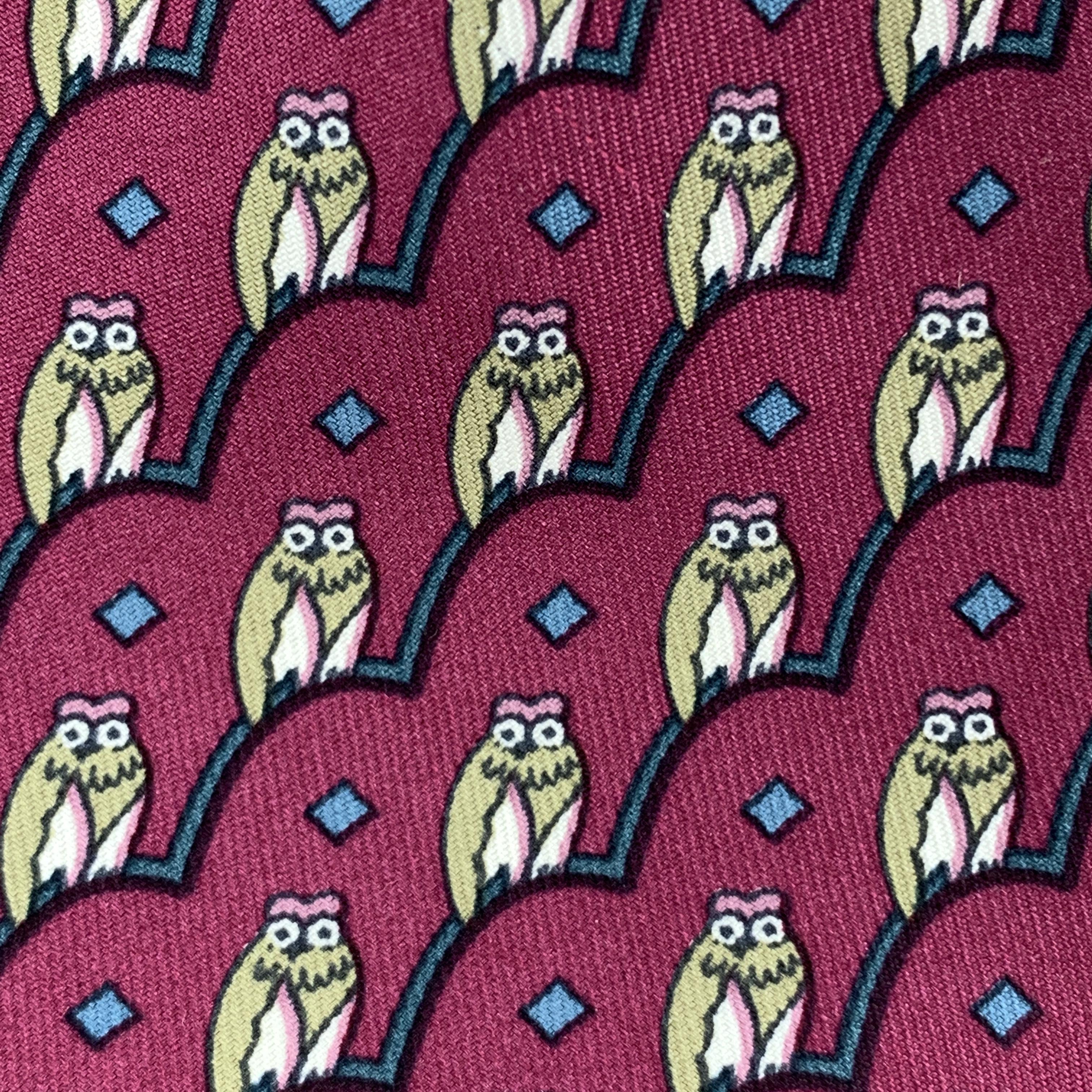 HERMES necktie comes in burgundy silk twill with all over owl print. Made in France.

Excellent Pre-Owned Condition.

Width: 3.45 in. 
