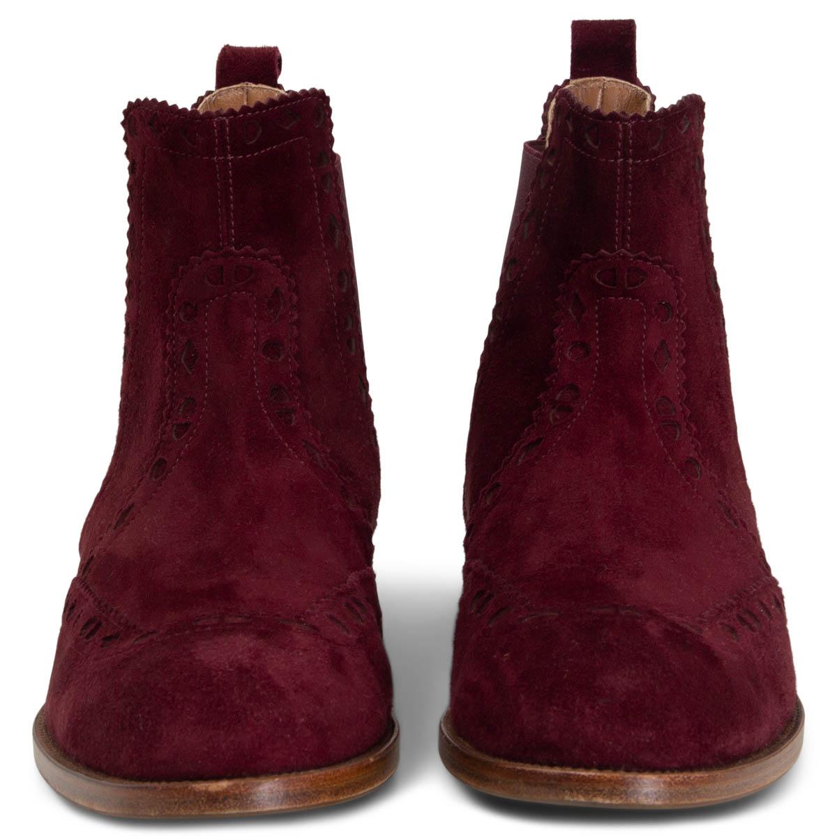 100% authentic Hermès Brighton flat brogue ankle boots in burgundy suede. Elastic band on the sides. Have been worn and are in excellent condition. Rubber sole got added. Come with dust bag. 

Measurements
Imprinted Size	39
Shoe Size	39
Inside