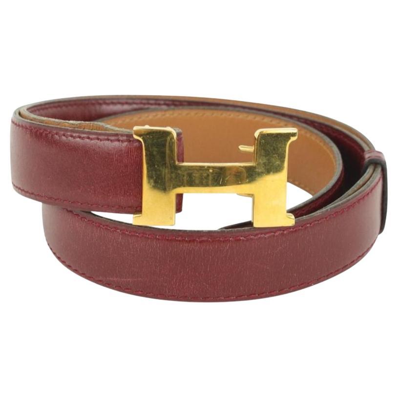 Hermès - Ceinture réversible Constance H, 24 mm, couleur bourgogne et or, avec logo, 1014h12 en vente