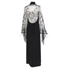 Hermès par Jean Paul Gaultier - Robe longue en dentelle guipure noire et soie, issue d'un défilé 2006