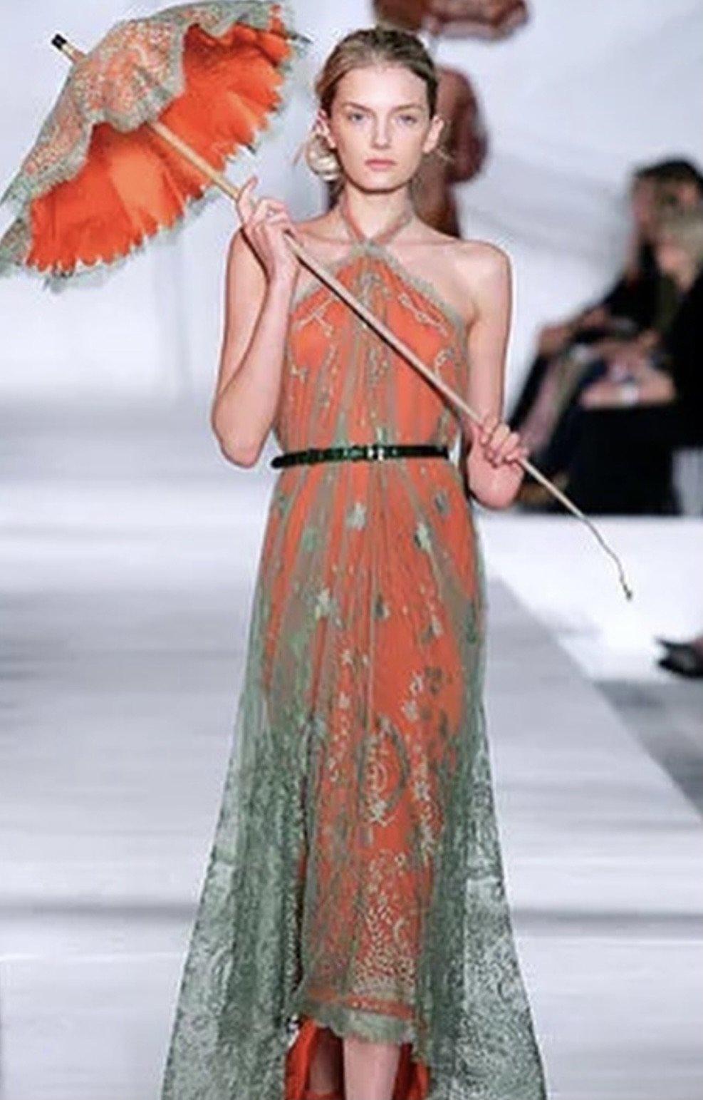 Beautiful Hermes 2006 Runway  dress from Jean Paul Gaultier era for Hermes.
Green Guipure lace with scalloped edges ,jersey orange lining and  embroidered Hermes Paris print on lace 
Excellent  condition.Please keep in mind that this is a vintage