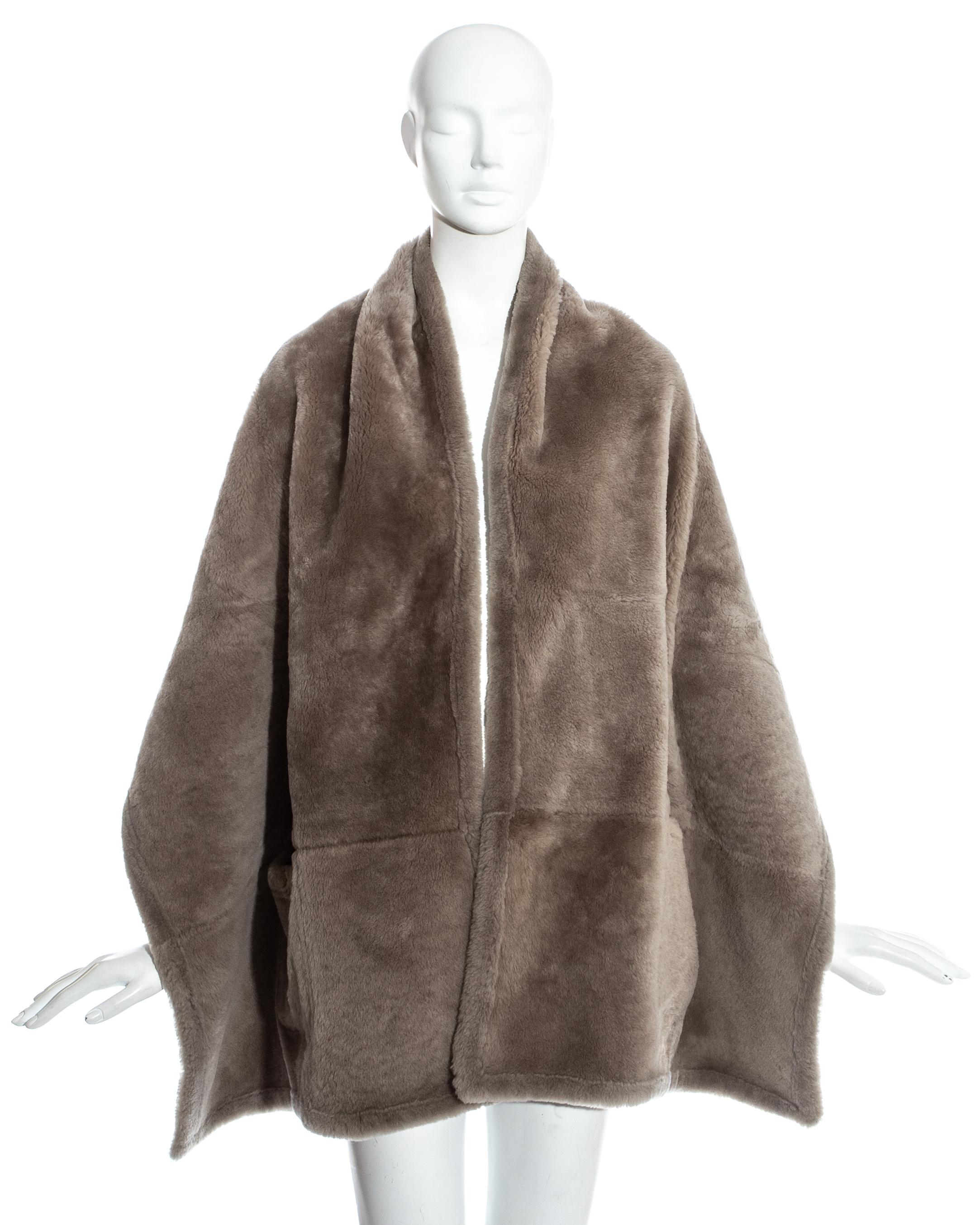 Hermes by Martin Margiela; mushroom shearling lambskin leather reversible stole. Two front patch pockets.   

Fall-Winter 1999
