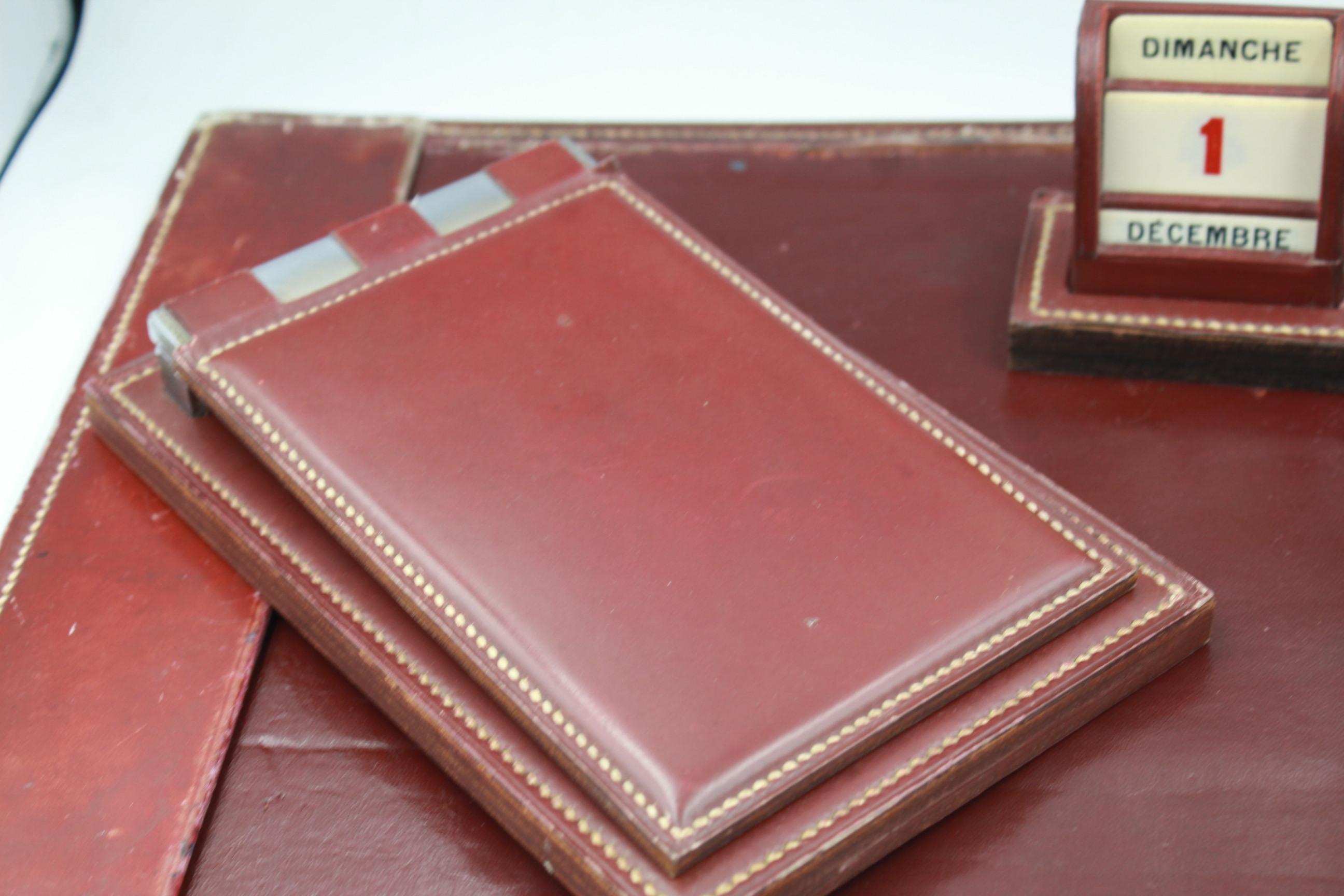 Hermes 50's/60's  4 pieces bureau set by Dupre-Lafon in Burgundy box leather. Relaly used but still a beautiful peice.
The calenda is missing some cards. 
Many signs of wear thats why its low price. 