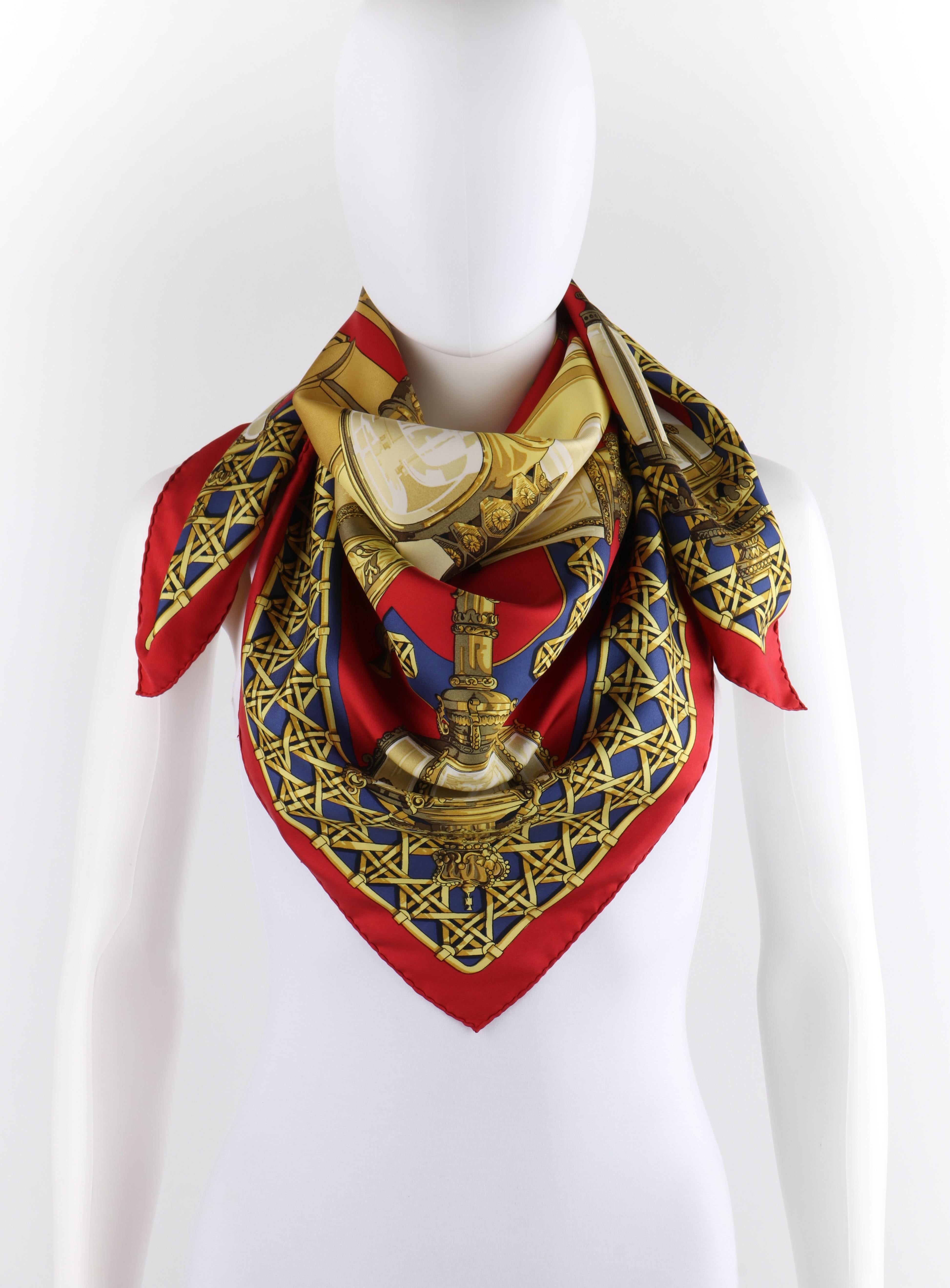 HERMES c.1971 Caty Latham “Feux De Route” Red Gold Blue Lantern Print Silk Scarf
 
Brand/Manufacturer: Hermes
Circa: 1971
Designer: Caty Latham 
Style: Silk scarf
Color(s): Shades of red, blue, yellow, brown, gold, white and black
Lined: No
Marked