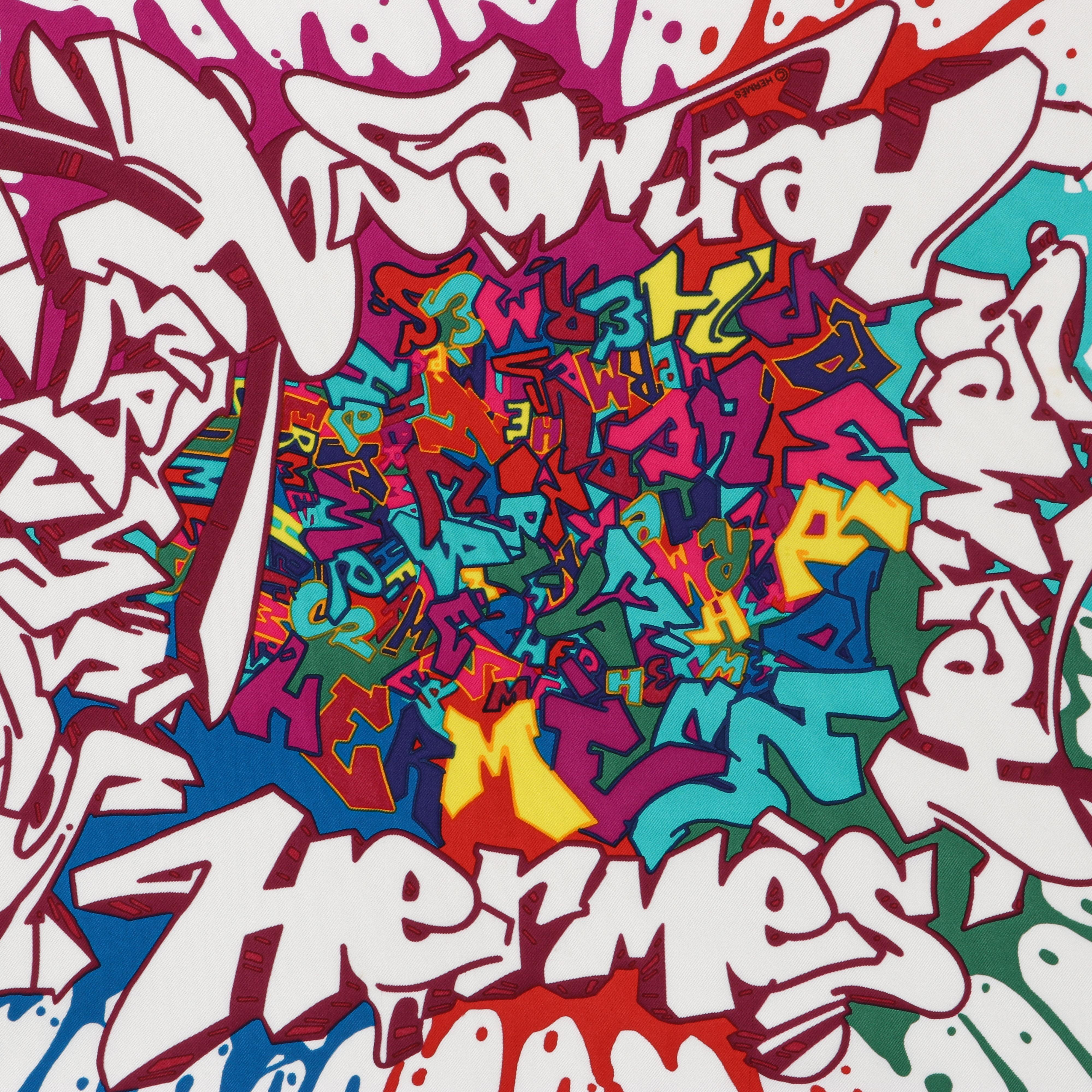HERMES c.2011 Cyril Phan Kongo “Graff” Multicolor Graffiti Art Silk Scarf w/Box 
 
Brand/Manufacturer: Hermes
Circa: 2011
Designer: Cyril Phan “Kongo” 
Style: Square scarf
Color(s): Shades of blue, turquoise, magenta, yellow, orange, pink, white,
