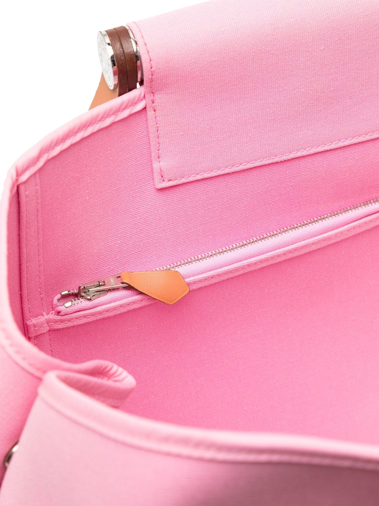 Pink
Canvas
Leather
Two-tone design
Stitched edge
Two top handles
Two long top handles
Main compartment
Internal zip-fastening pocket
Internal slip pocket
Silver-tone hardware
Stamp O Square, 2011
Condition: This previously owned and used item is in