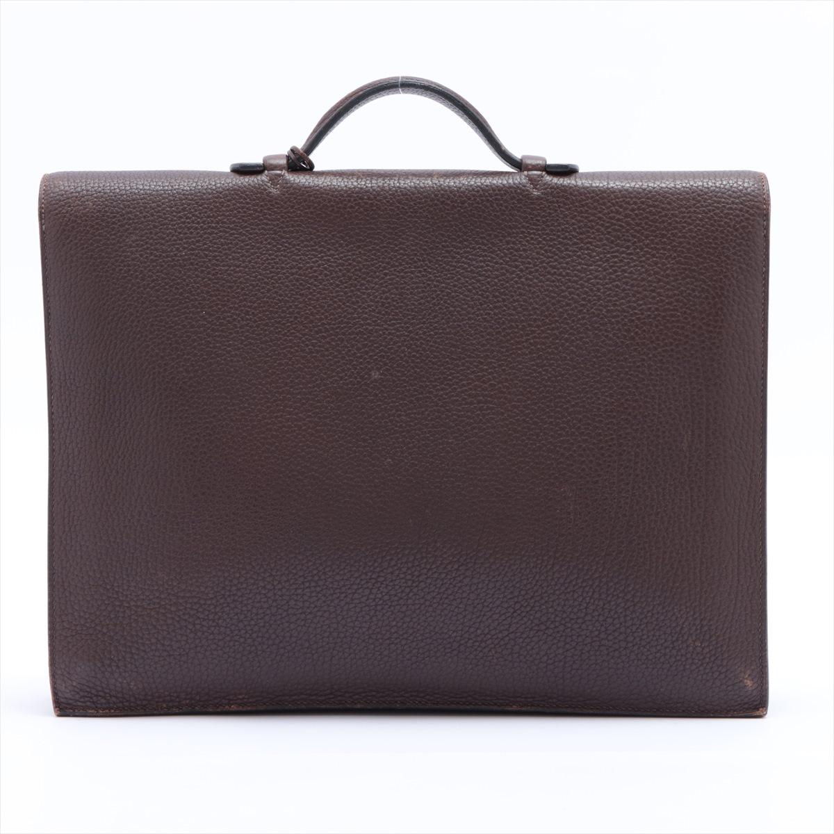 Cacao Togo calfskin leather natural veining with a soft pebbled finish Hermes Sac a Depeches briefcase bag, paired with palladium plated hardware and a single flat top handle, flap top with flip lock and keys, one rear flat pocket outside and one